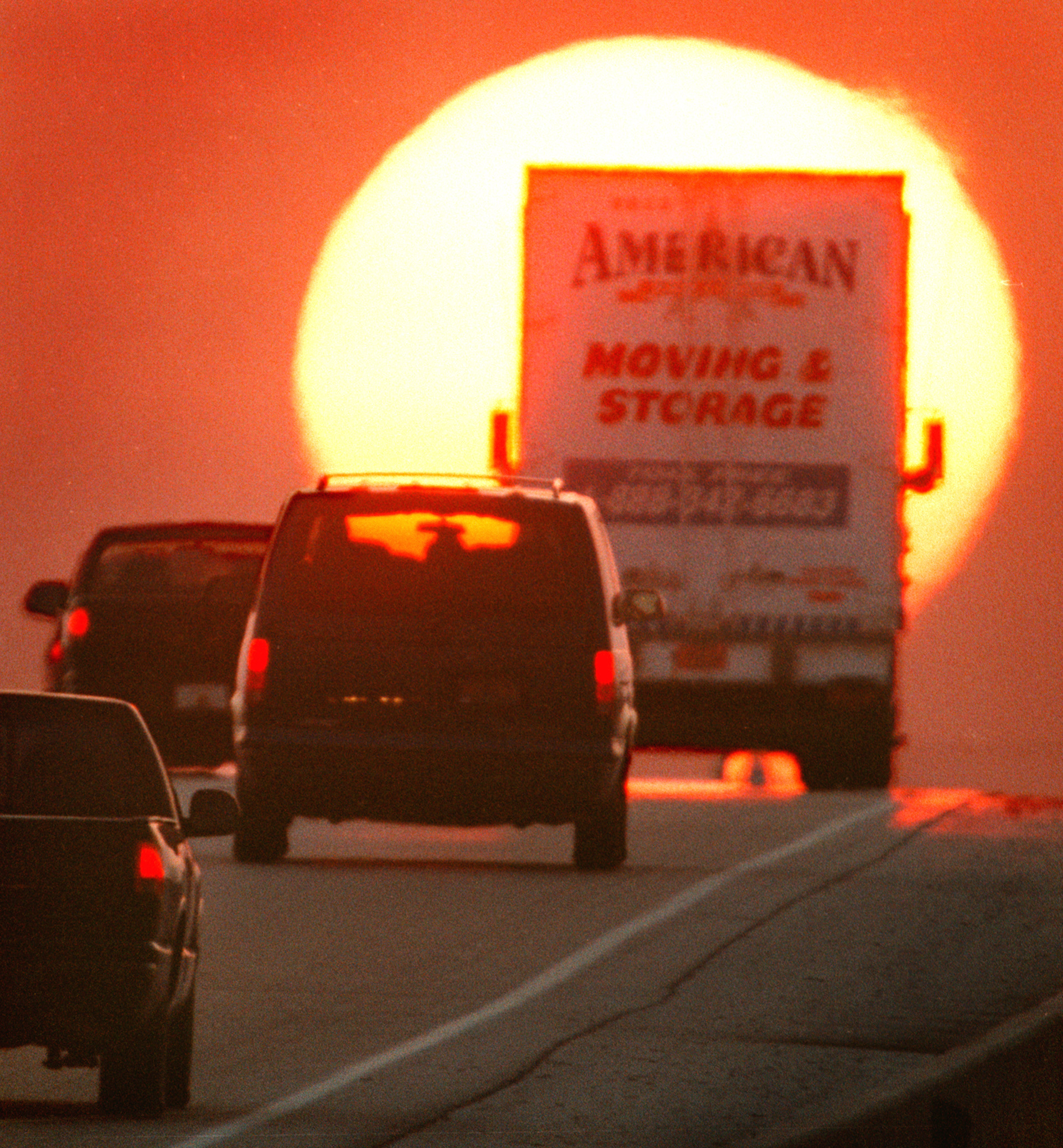 A moving van heads to west Broward County where the sun is setting on the land rush.