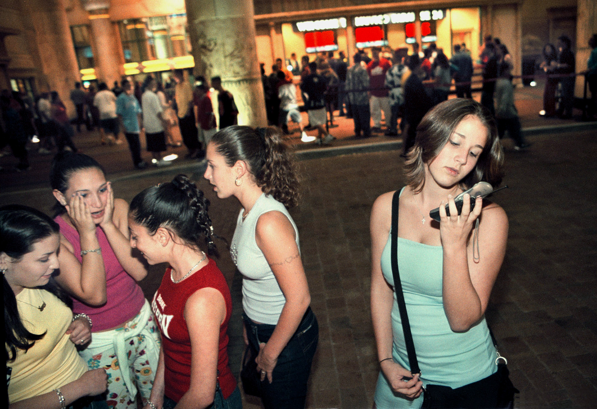 Jenna Hoffman, right, with friends outside movie theater.