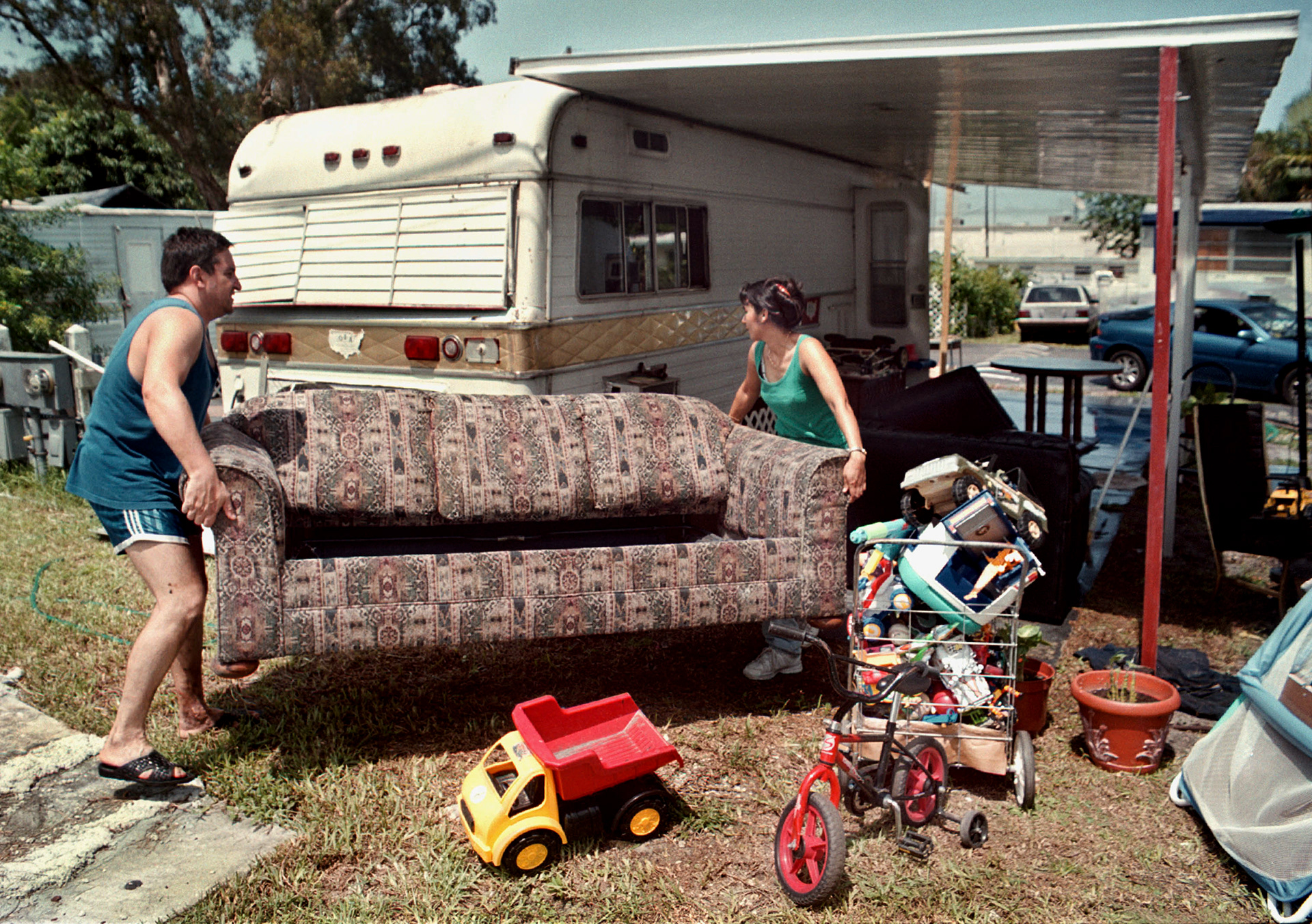 Martinez family manages by living in tiny trailer.