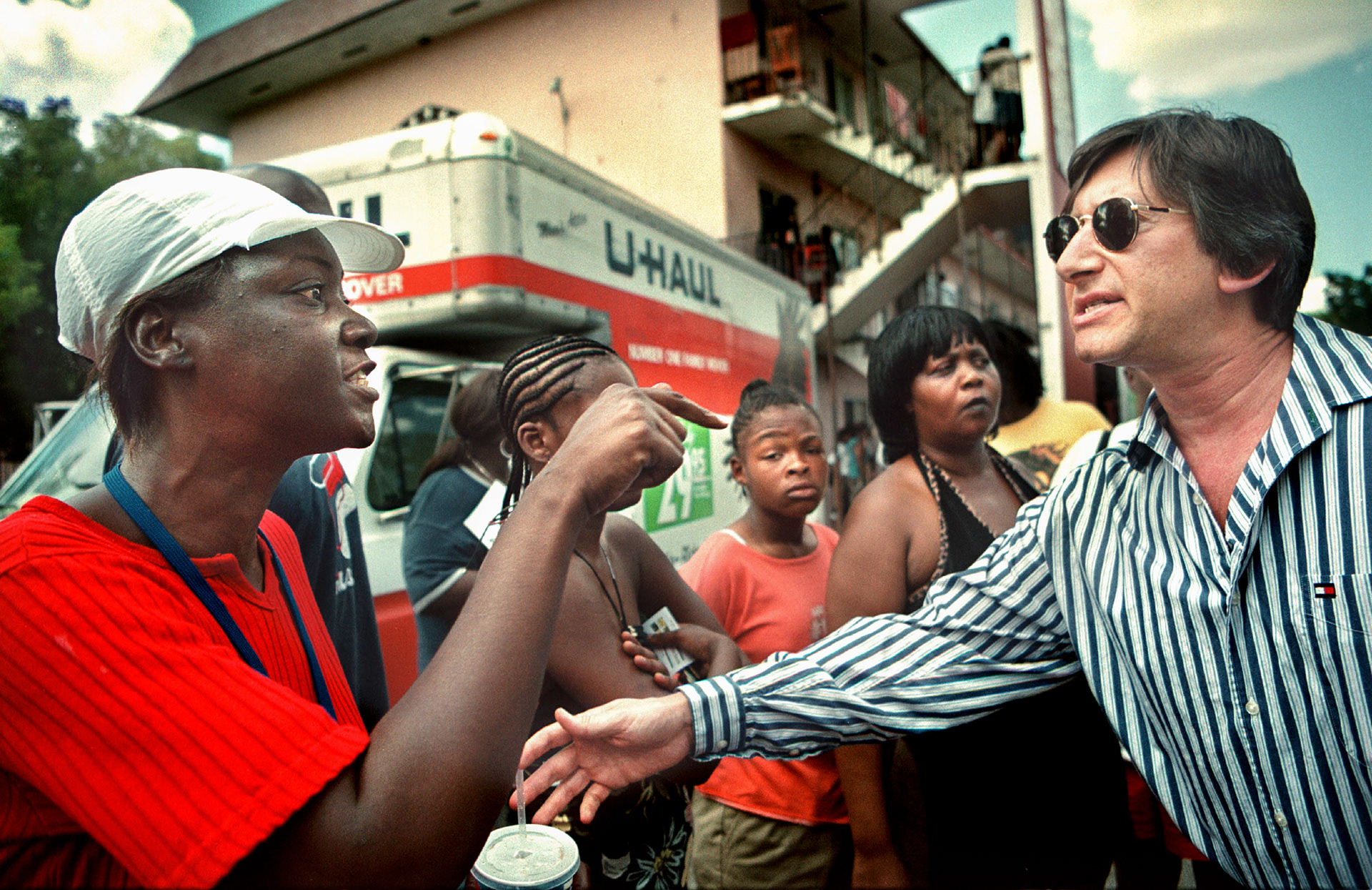 Evicted resident Katherine Clyde argues with landlord’s attorney.