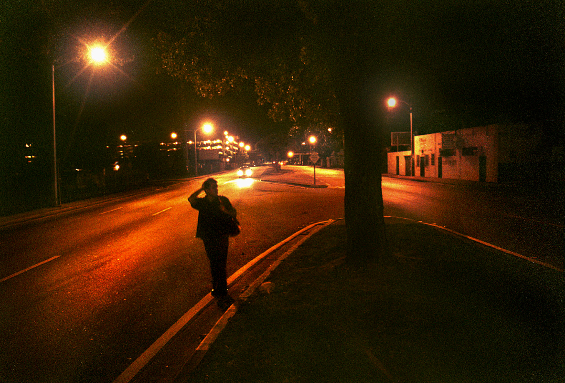 Herrera takes pre-dawn walk home from bus stop.