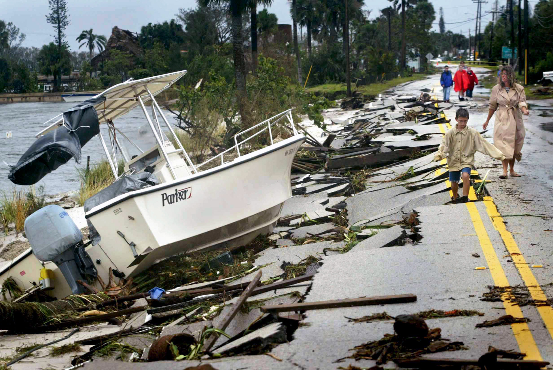 Jensen Beach residents survey the damage by Hurricane Frances.