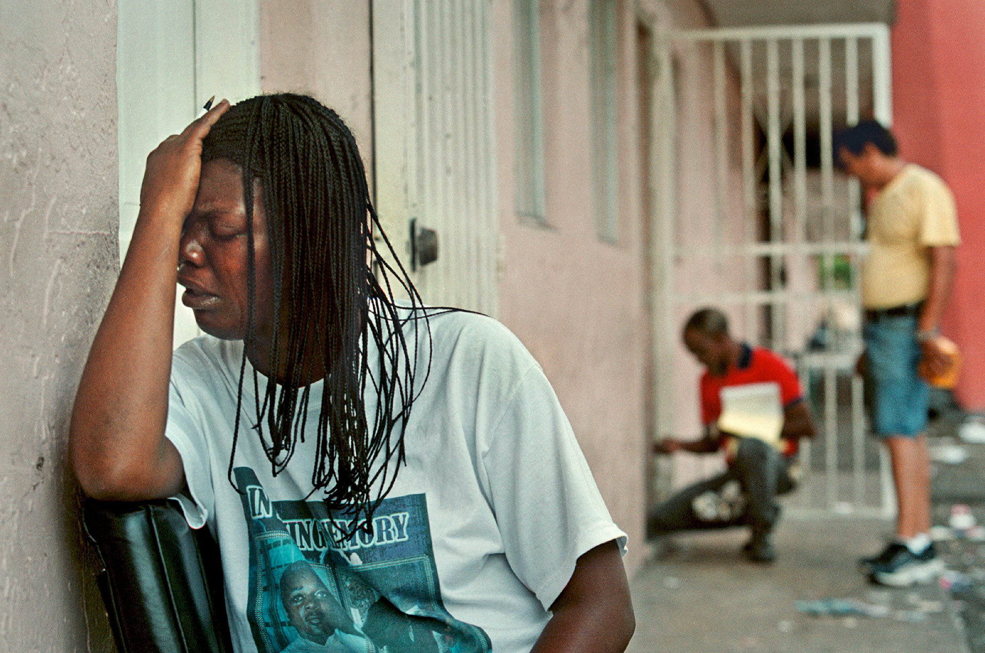 Locksmith locks-out evicted resident Alanda McMillion from apartment.