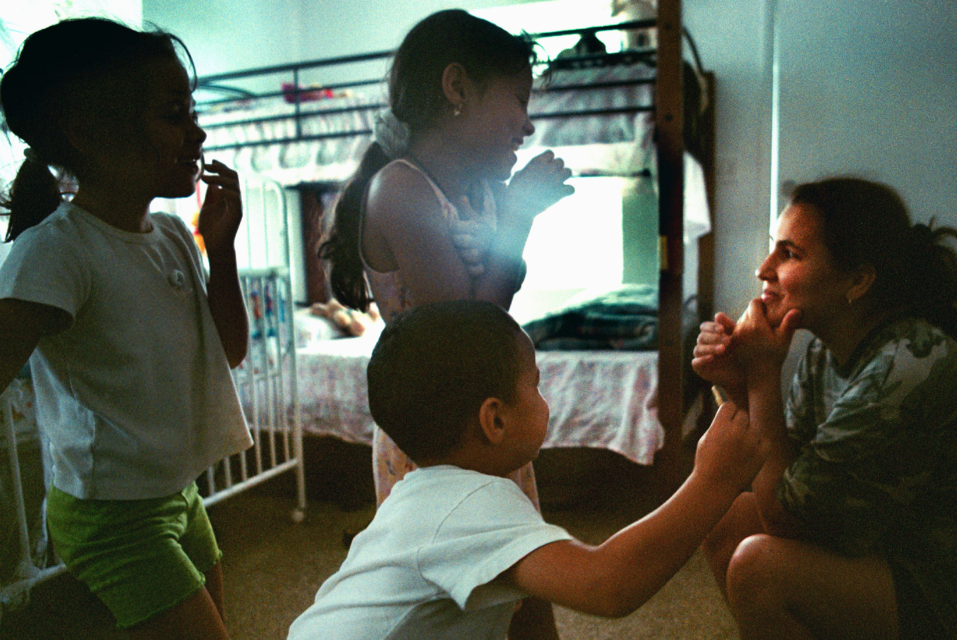 The children convince Mom to outing in park, the only affordable activity.