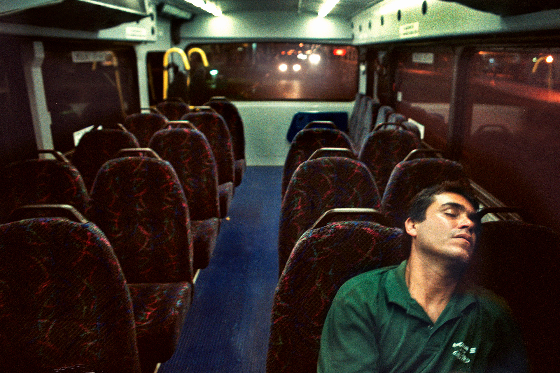 Herrera, exhausted, can’t help but continue sleeping on bus.