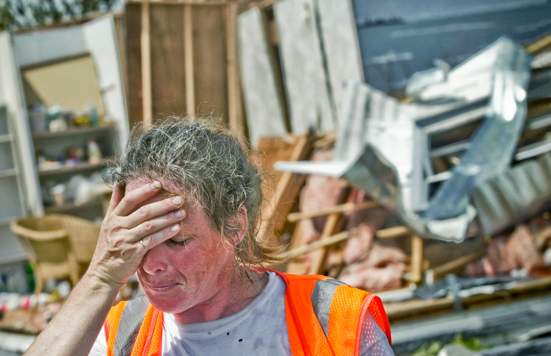 Hurricane Frances victim is overwhelmed at the destruction in her neighborhood.