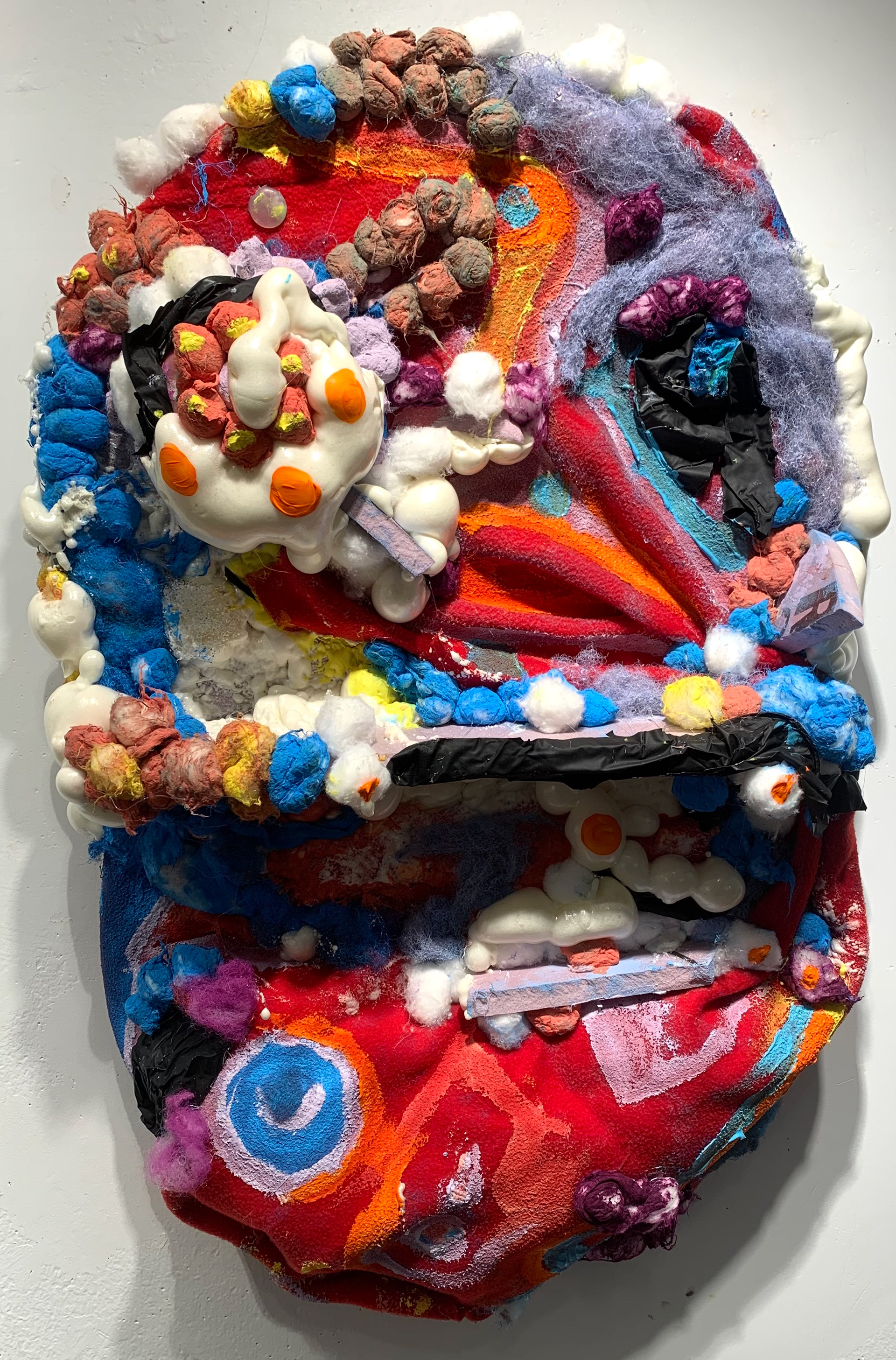 "Soft and no.7, the pills of pursuit"2.5ft by 1.5 ft. screenprinting ink. molding foam.acrylic, screen printing ink, cotton and felt on sculptural foam