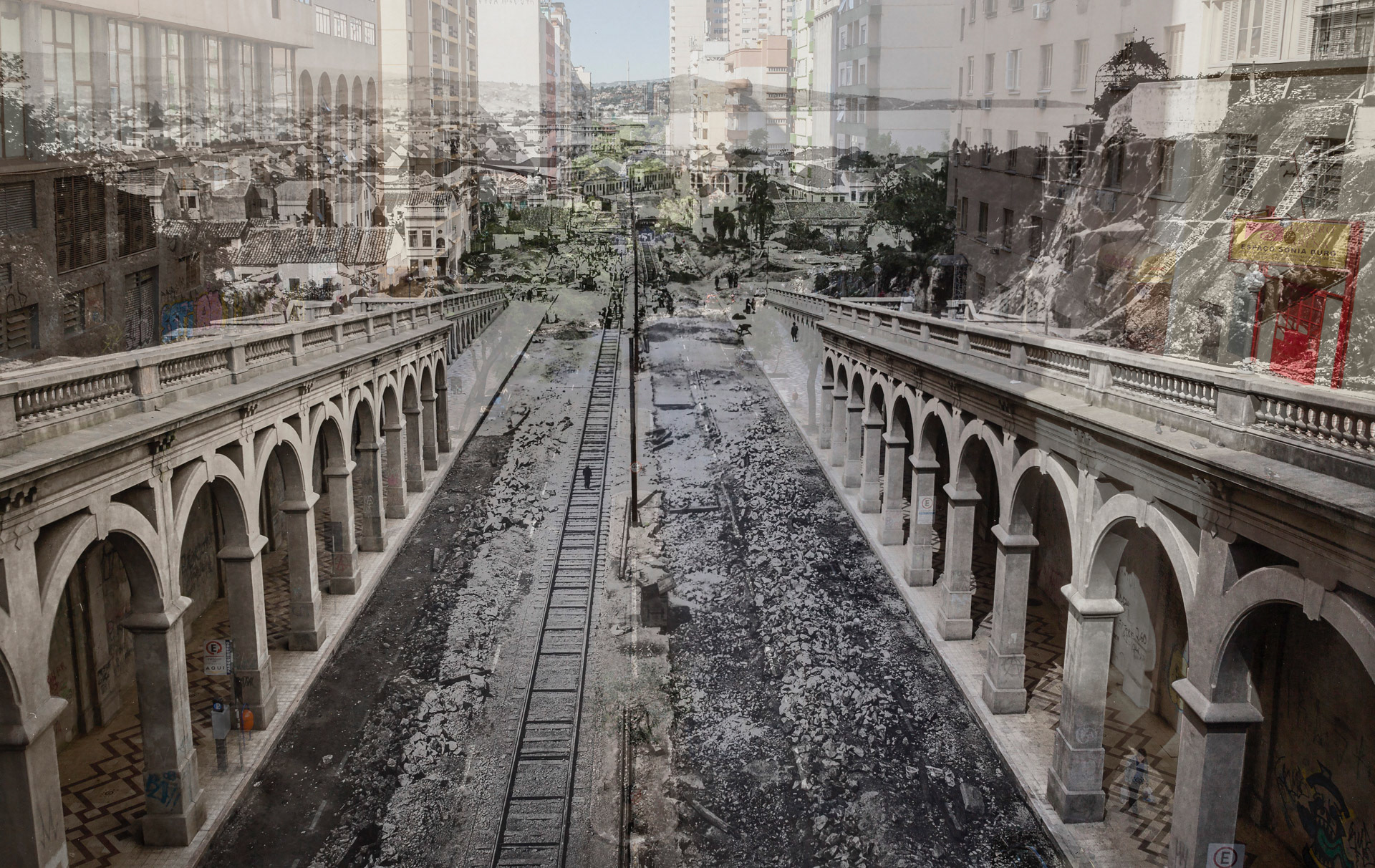 MEMO POA / Viaduto Otávio Rocha - S/D Autor: desconhecido Um dos cartões-postais de Porto Alegre, o Viaduto Otávio Rocha, cuja extensão em direção à AvenidaPraia de Belas foi entregue em 1943, abriga sob seus históricos arcos e escadarias, lojas de discos, artesanato, lancherias, sebos, ourives, sapataria, barbearia, lanchonetes, floras. Também conhecido como Viaduto da Borges, é um dos pontos turísticos da capital, sendo bastante utilizado para produções fotográficas, filmes e peças publicitárias. Em 1988, foi tombado como patrimônio histórico. MemoPOA 2016. Anderson Astor, Eduardo Aigner e Marcelo Curia. Fumproarte, SMC, PMPA.