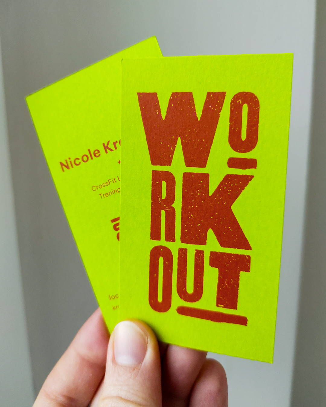 Digital printing on mass-dyed paper for personal trainer business cards.