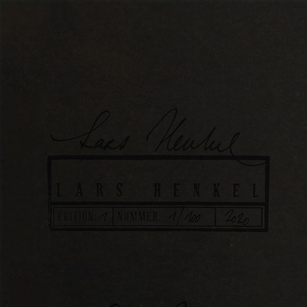 black signature on black print