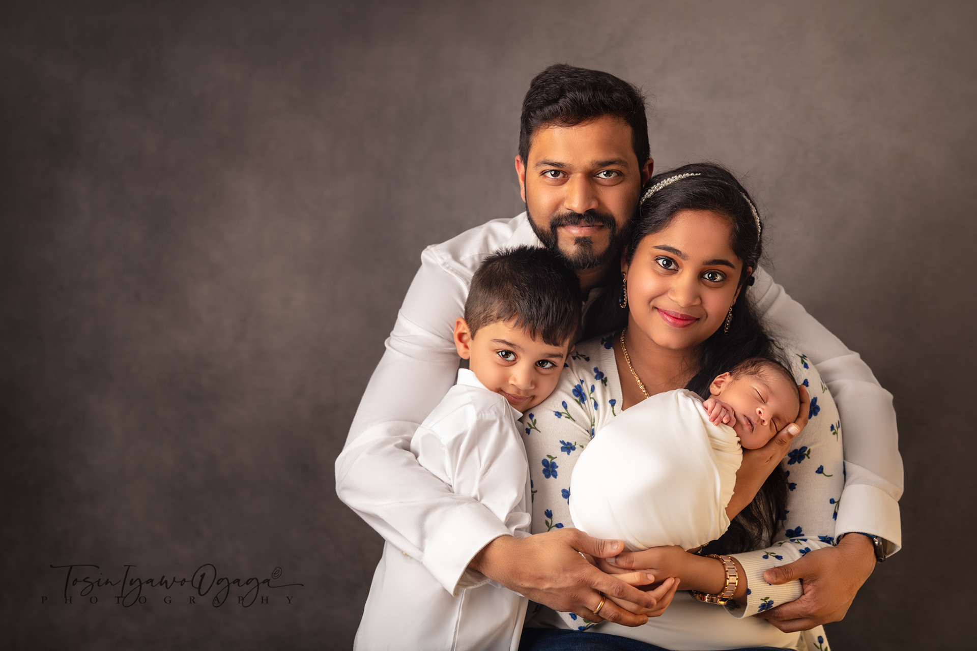 Family of four with newborn by TIO Photography
