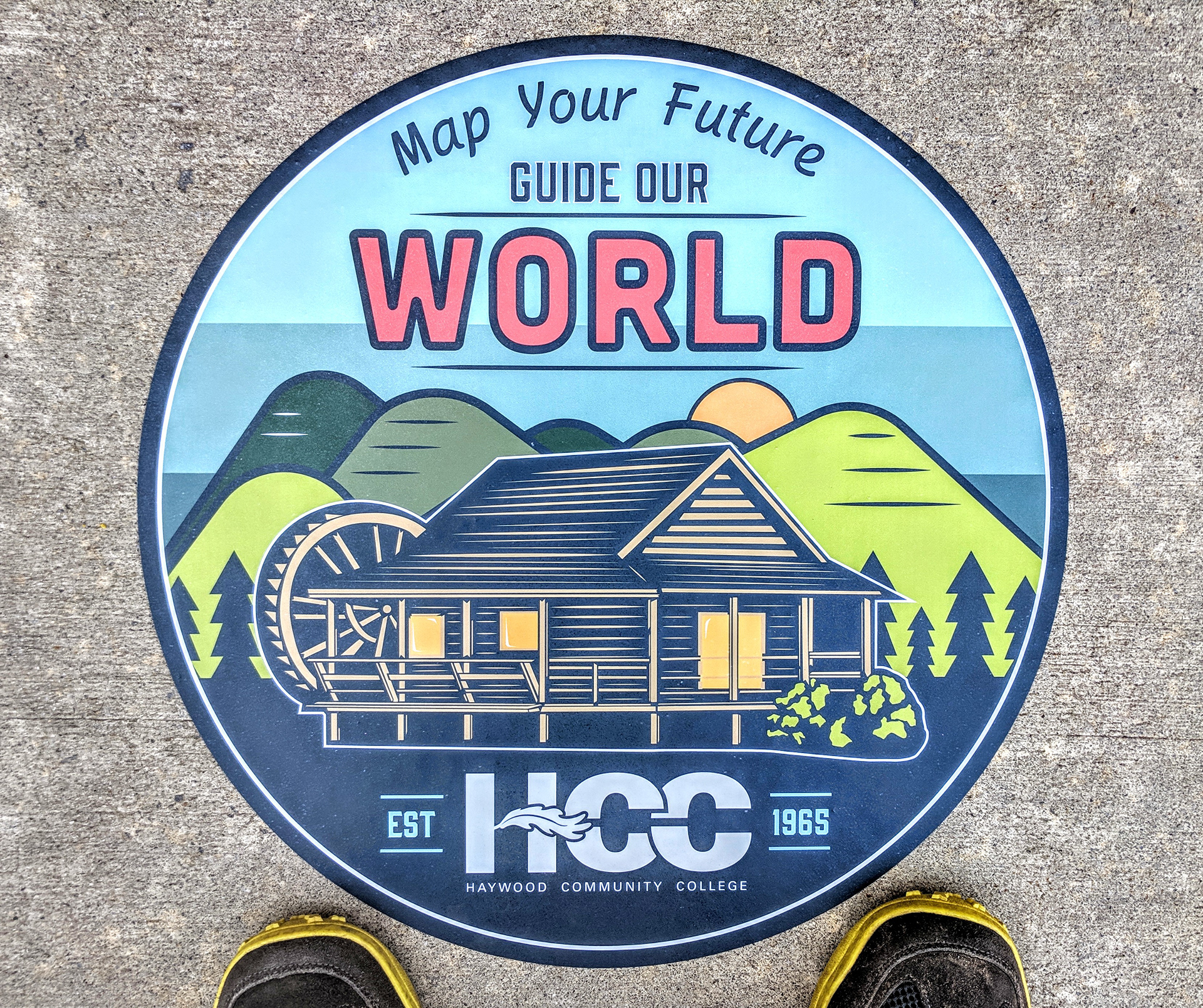 18" floor sticker placed throughout Haywood Community College Campus promoting new slogan