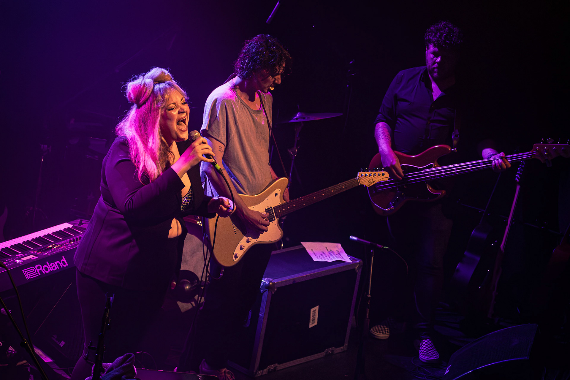 Matt Myers of Houndmouth performs with opening act, Carly Johnson and her band