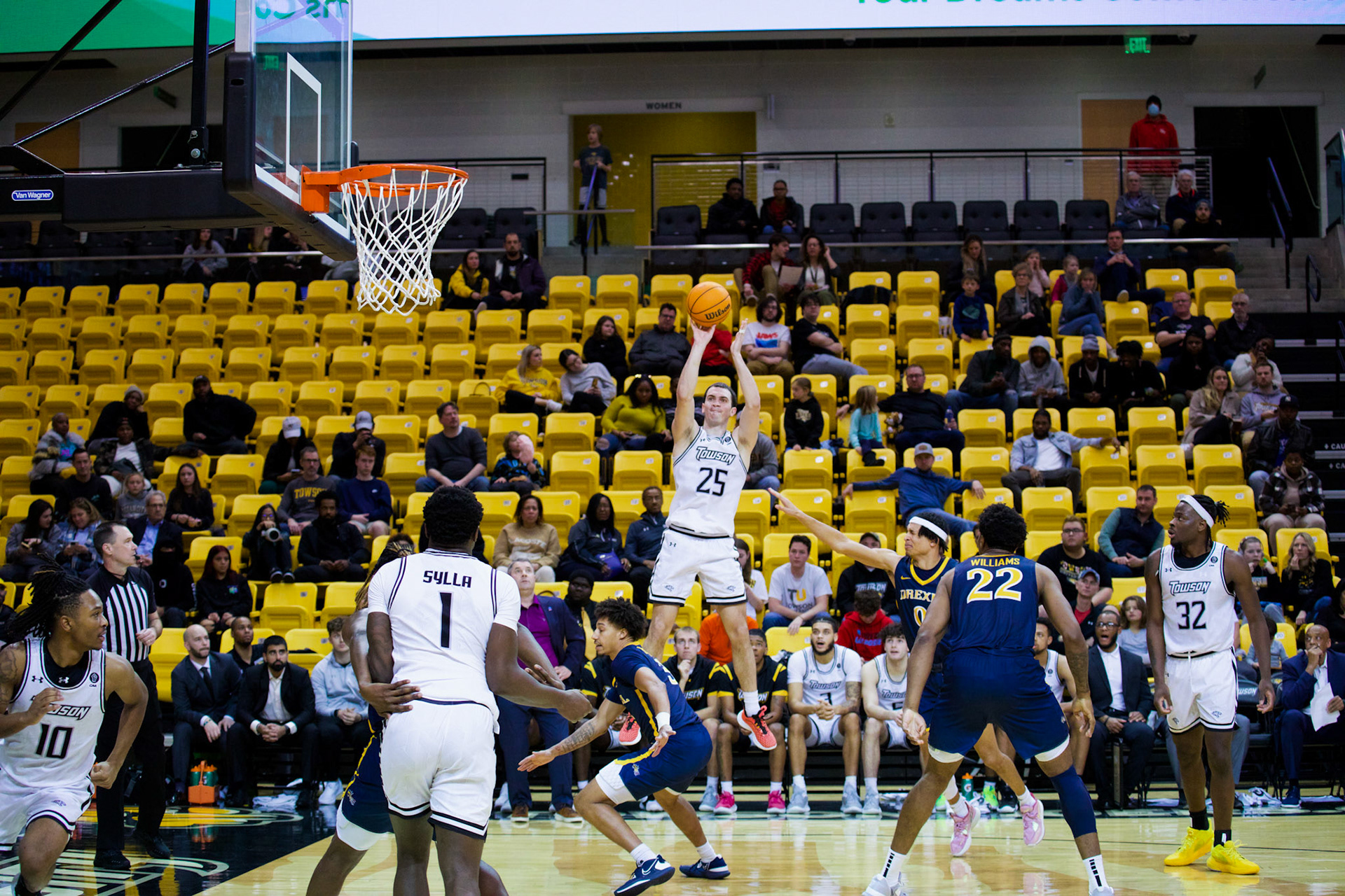 Towson Men's Basketball No. 25 Nicolas Timberlake shoots for a three-pointer