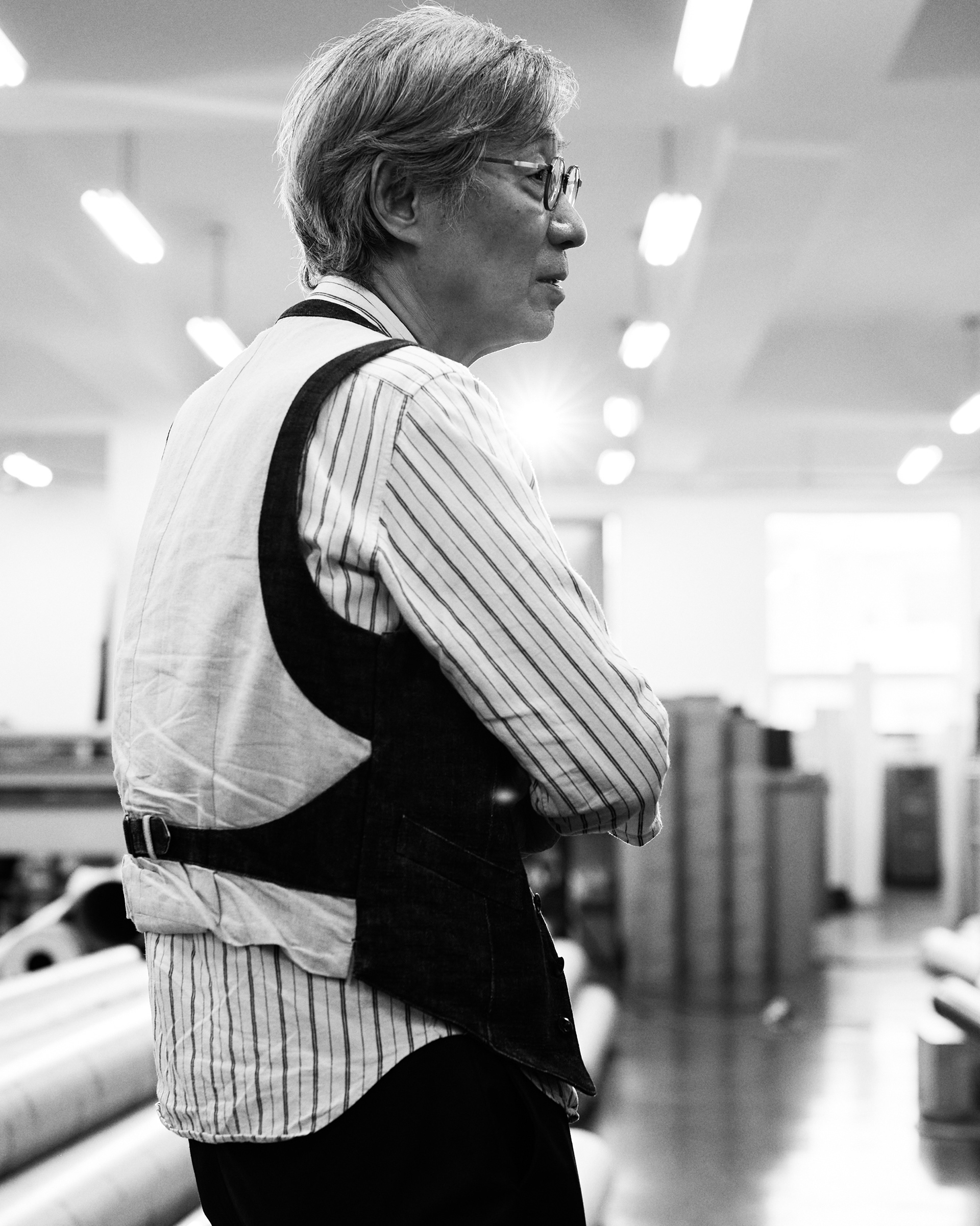 Photographer Bohnchang Koo supervising print quality for Frieze Seoul × Shinsegae