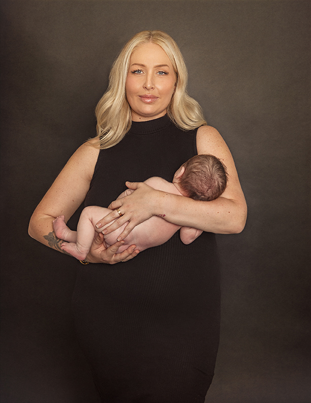 Mother with Newborn Portrait in Studio