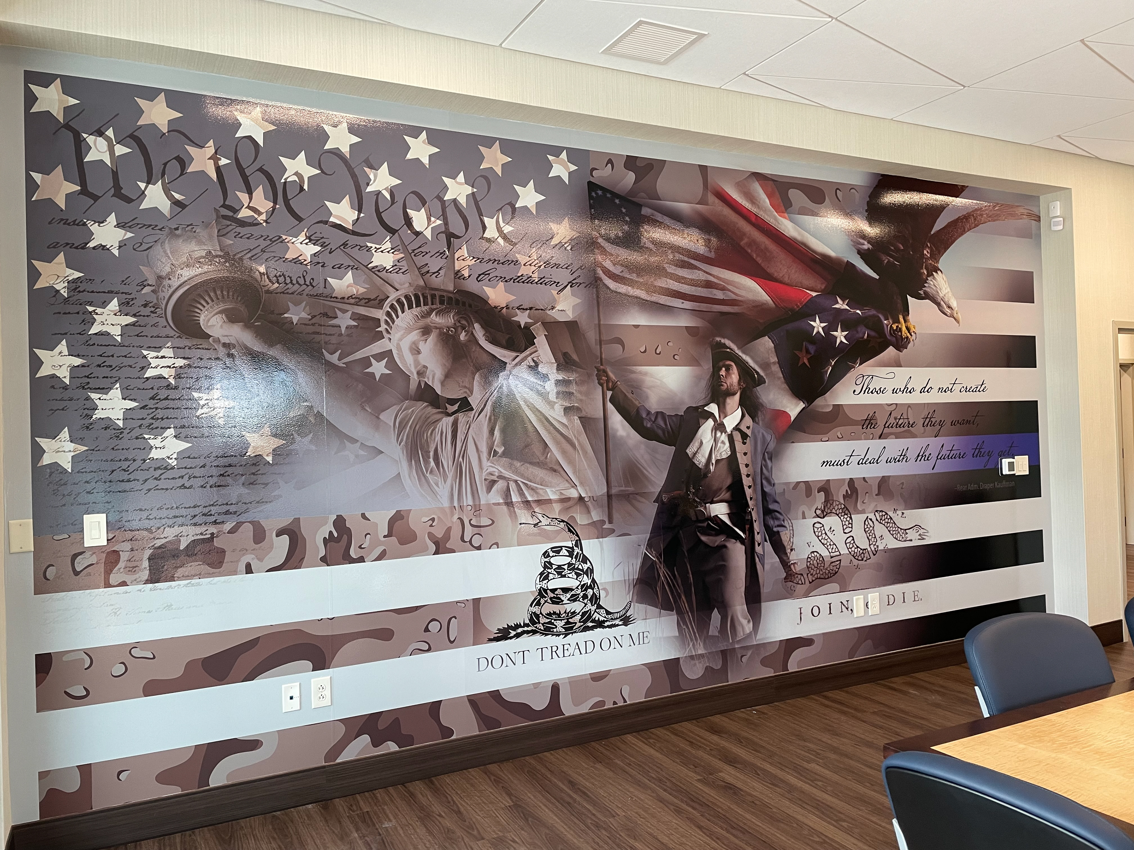 Collage mural full-wall decal installed in board room