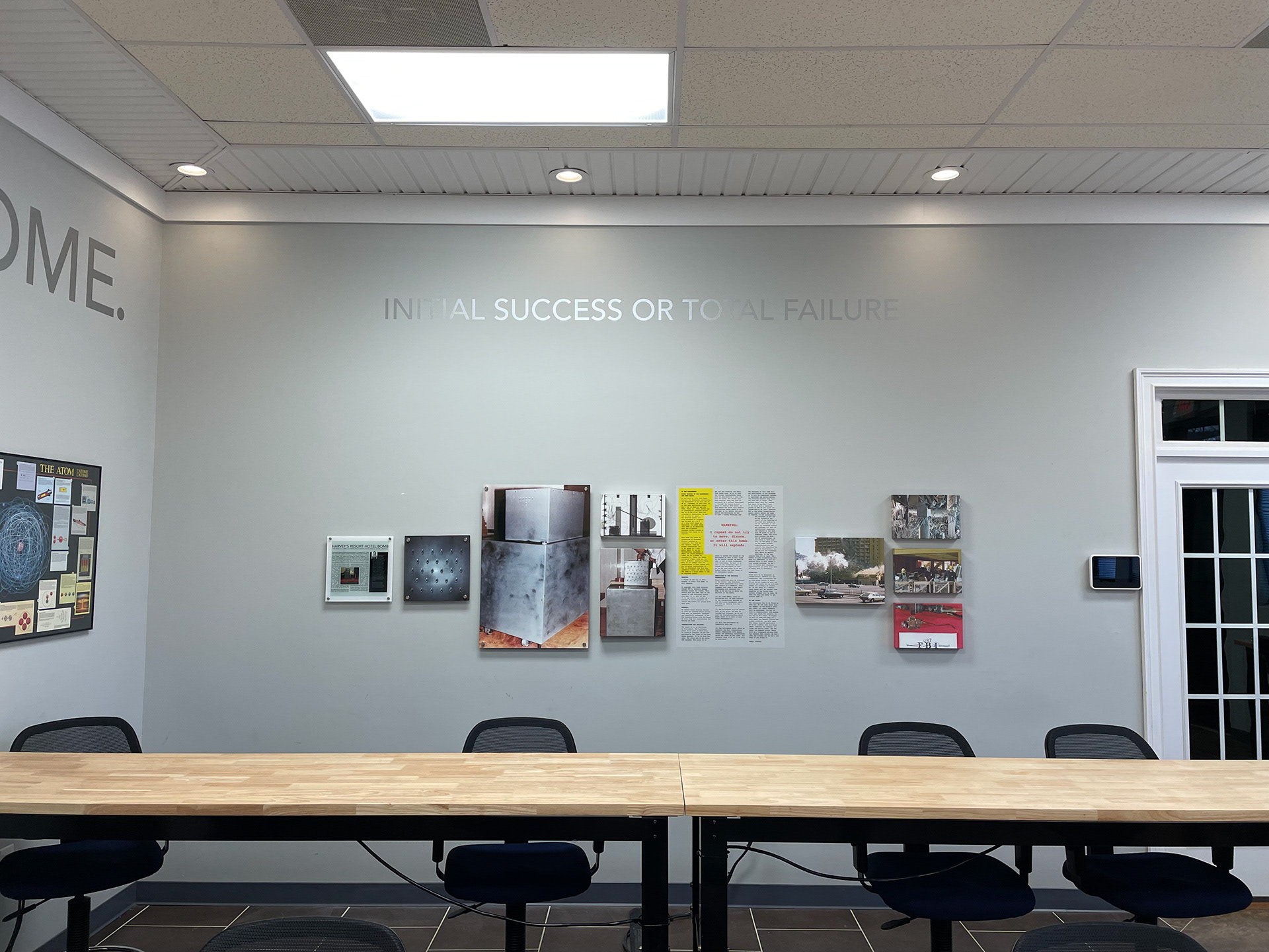 wall decal and Harvey's device art in training facility classroom