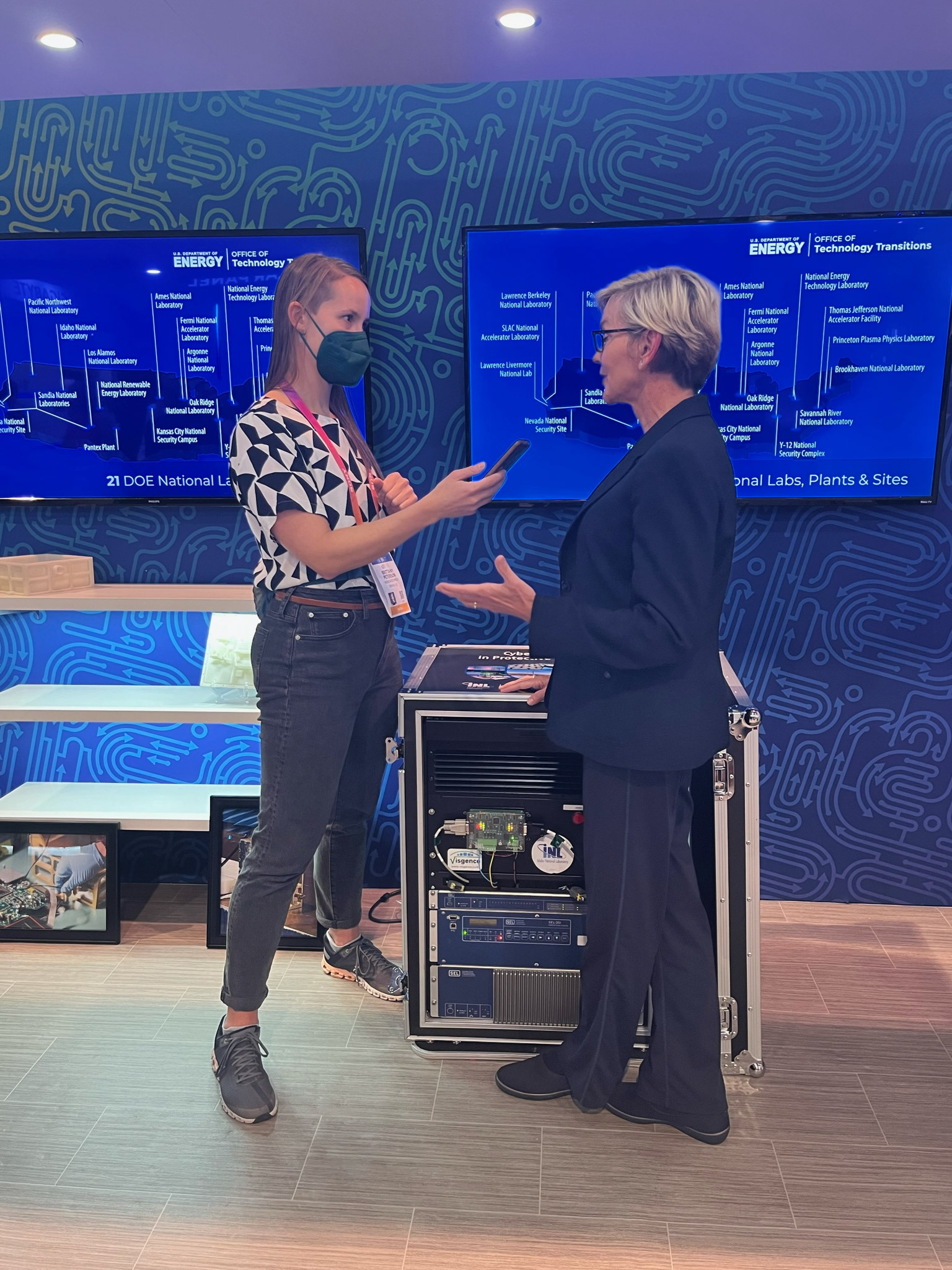 U.S. Secretary of Energy being interviewed at the booth.