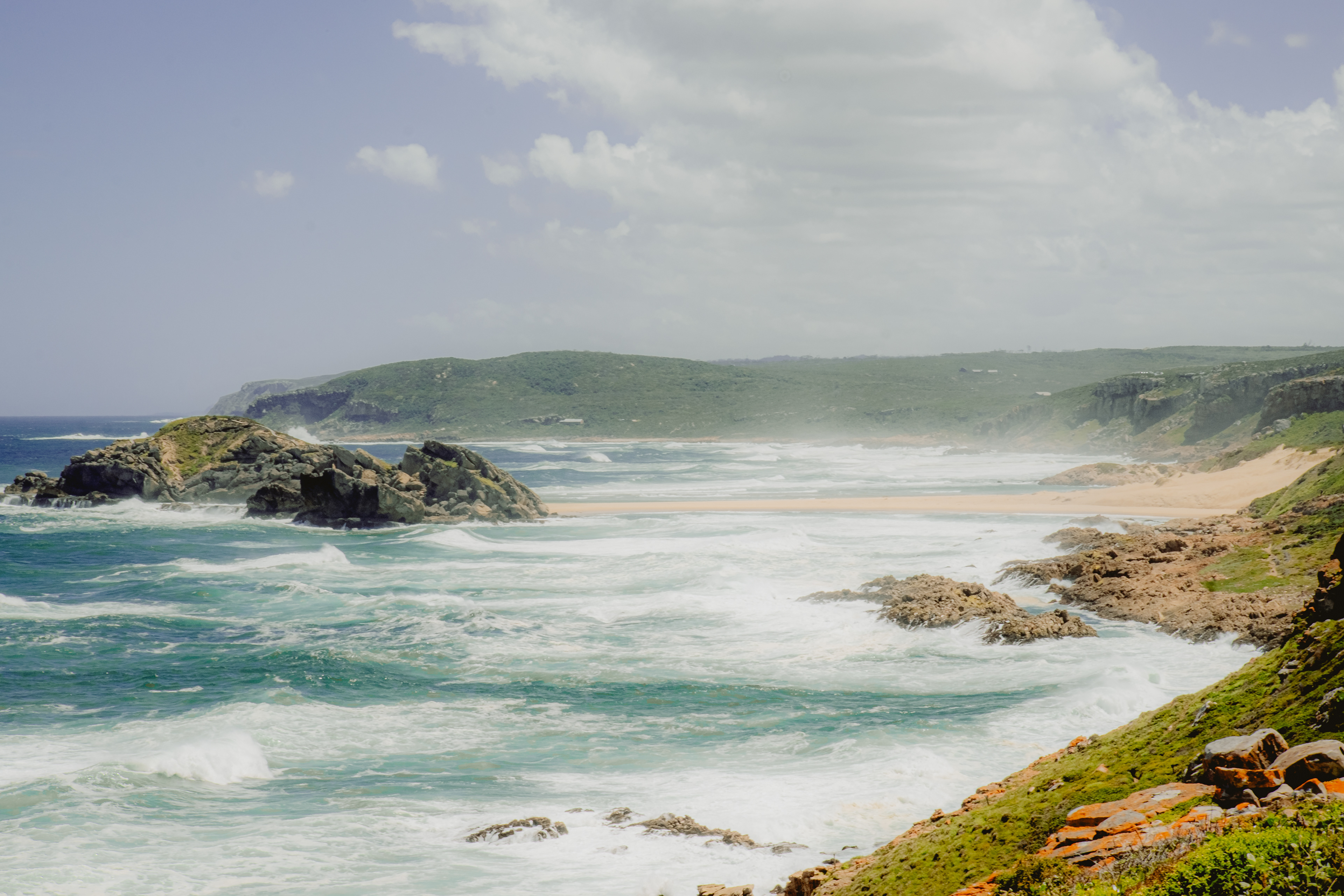 Sand rising up by the cliffs, Robberg Nature Reserve, South Africa 2023