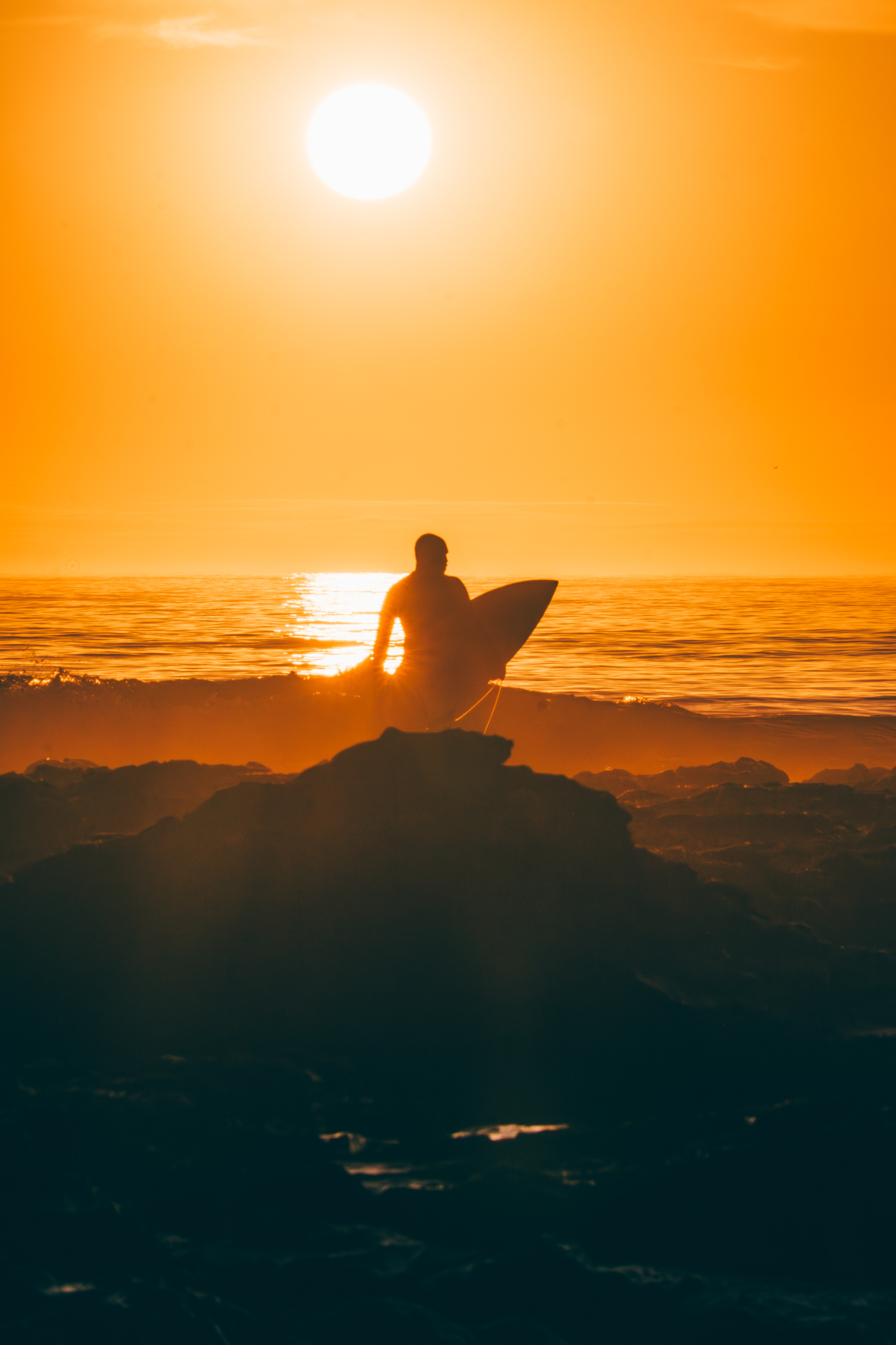 Surfer at sunrise, Jeffreys Bay, South Africa 2023