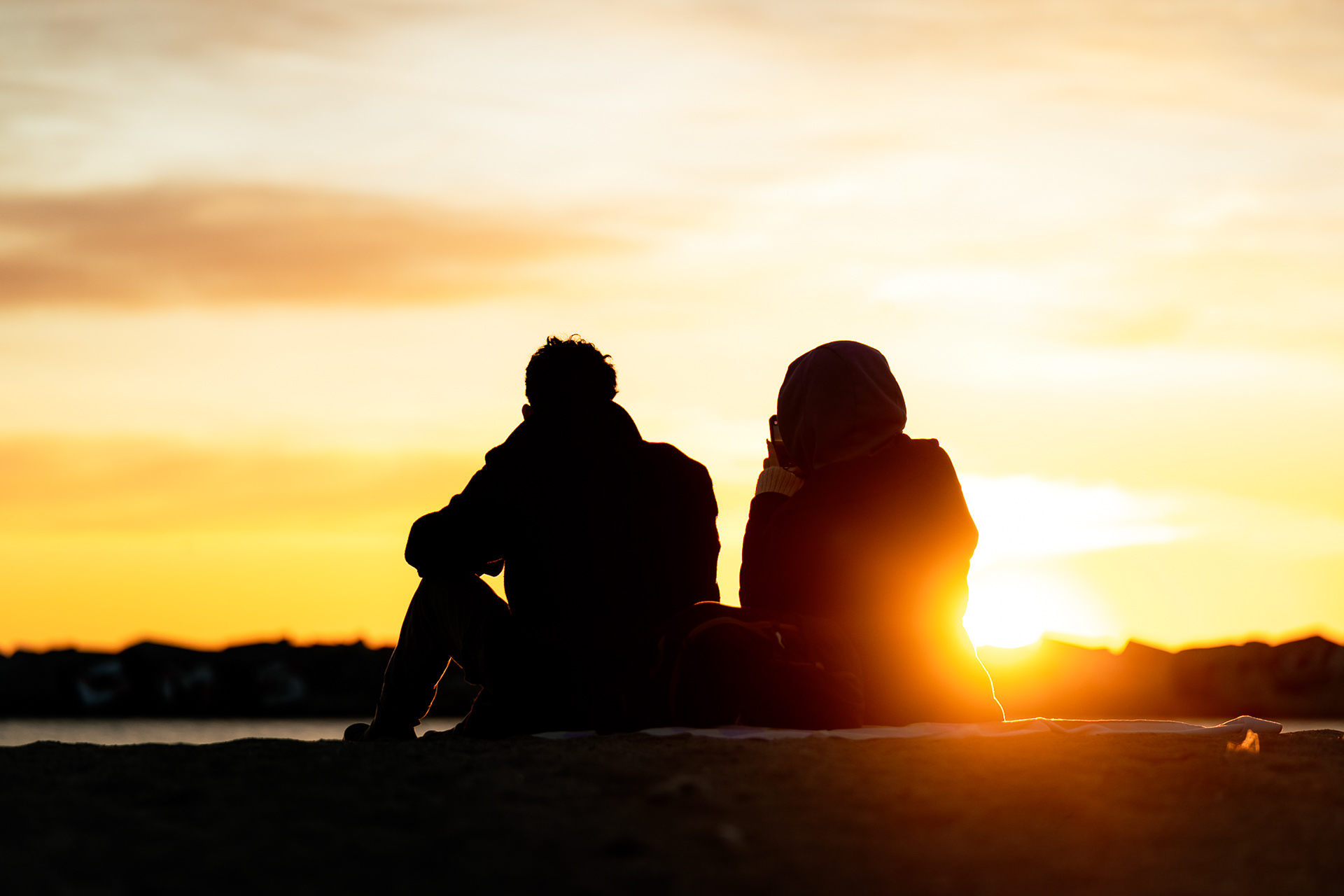 Sunset spiritual gathering in natural Barcelona setting recorded and photographed with warm tones and meditative focus