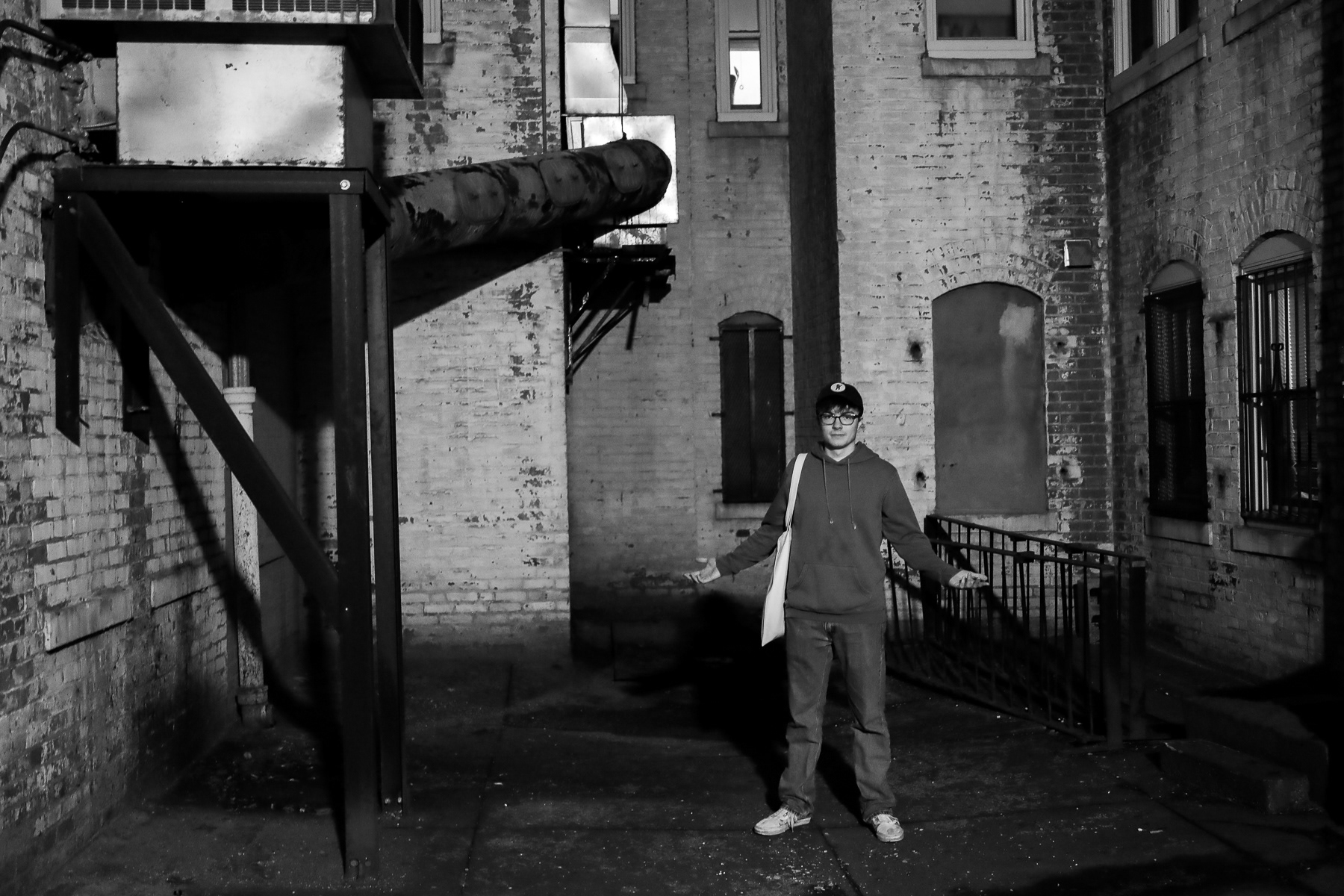 Andrew Burke-Stevenson behind his on-campus apartment; March 31st, 2025.