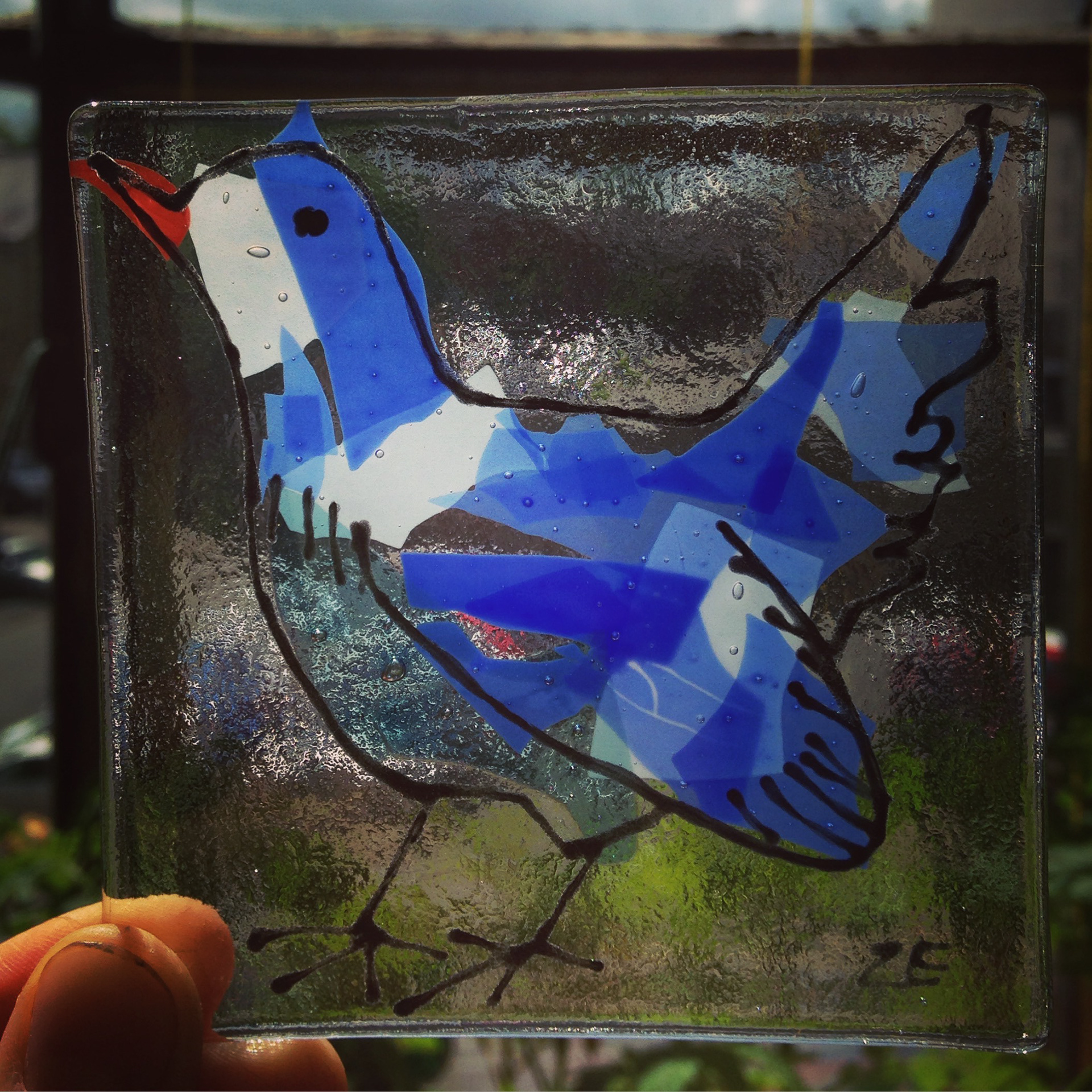 Fused and stained glass birds tiles. Kiln fired. Made by Zoe Eady at the Glass Garden, Leeds. Blue