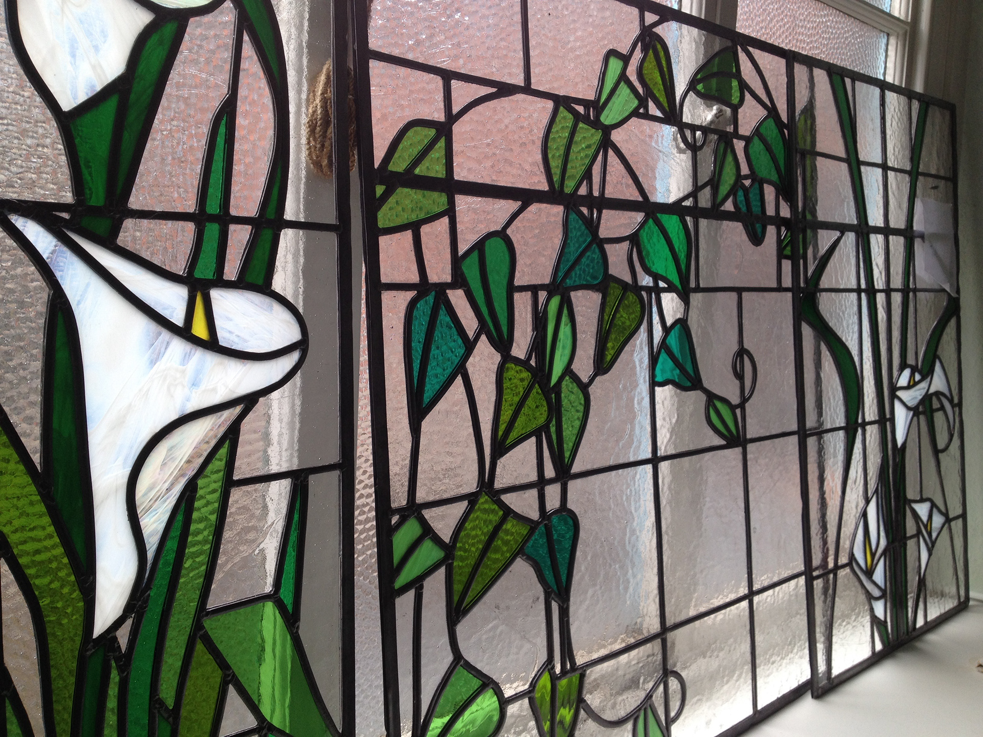Traditional Stained Glass and art glass panels using Art Nouveau theme by Zoe Eady of The Glass Garden. Calla Lilly and ivy