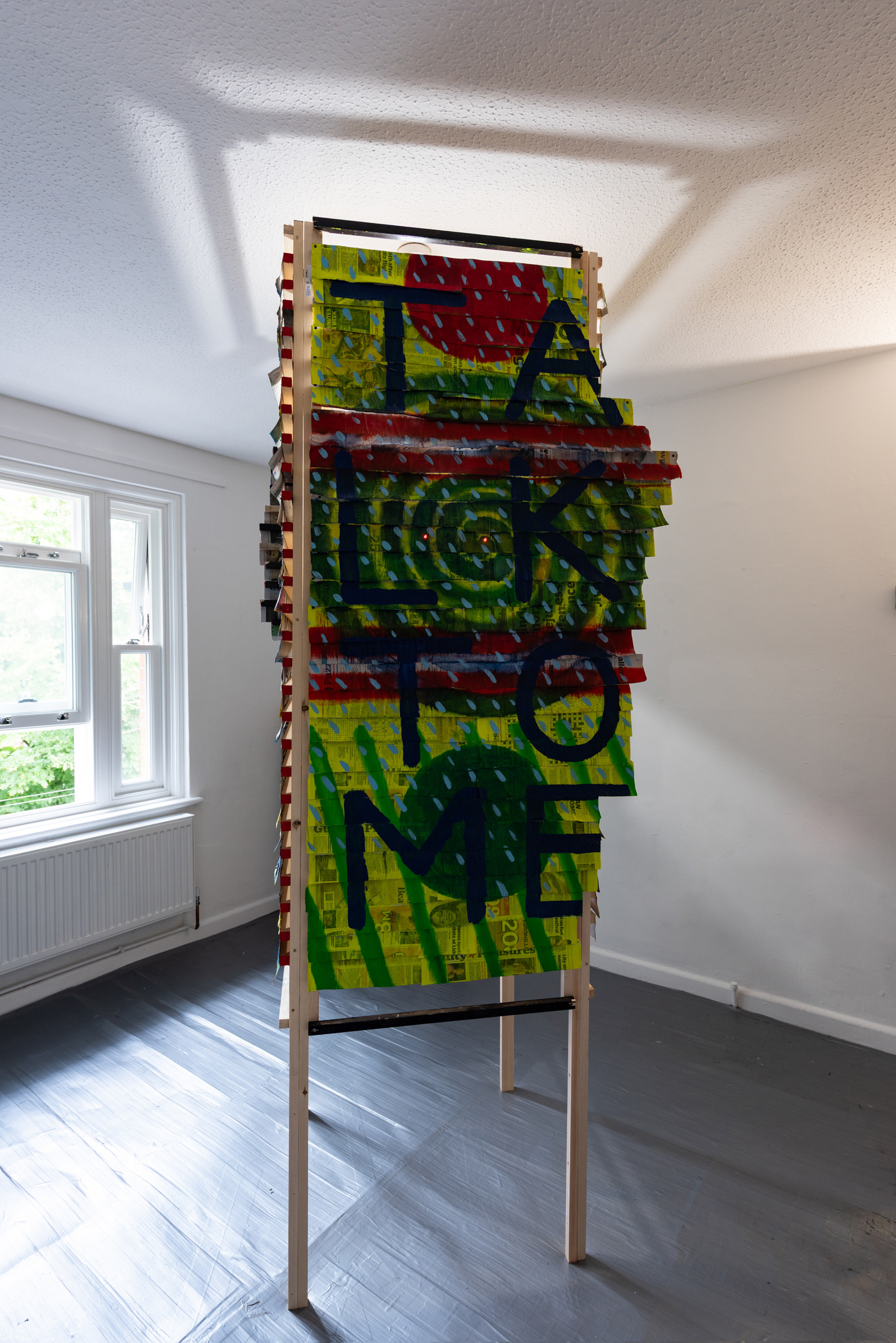 Indianna Solnick - TALKTOME - 2025 - oil on newspaper, wood, encaustic, LED Lights - 80 x 80 x 240cm