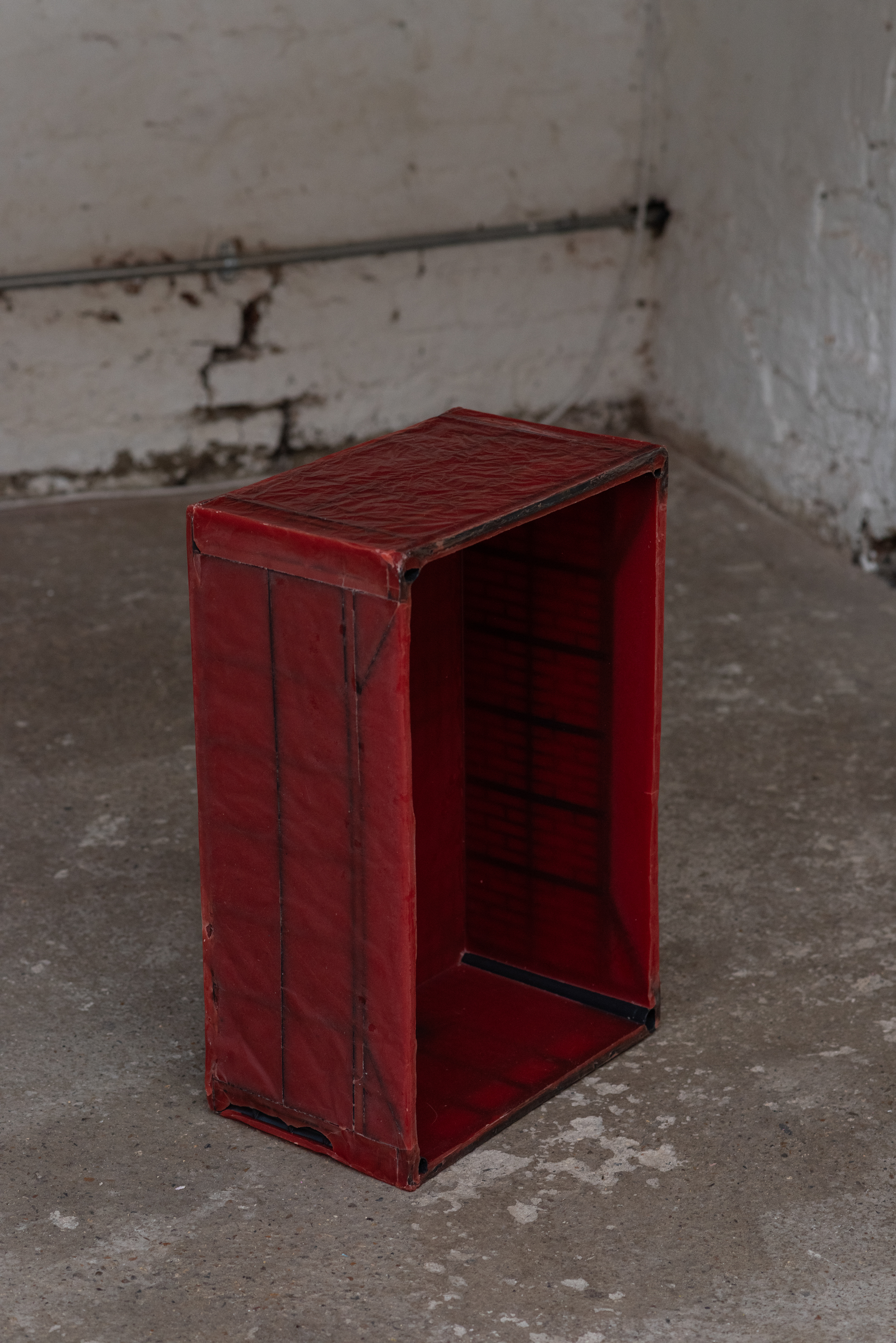 Darren O’Connor  - Untitled -  (2025) - plastic food crate, red candle wax - 60 x 40 x 25 cm