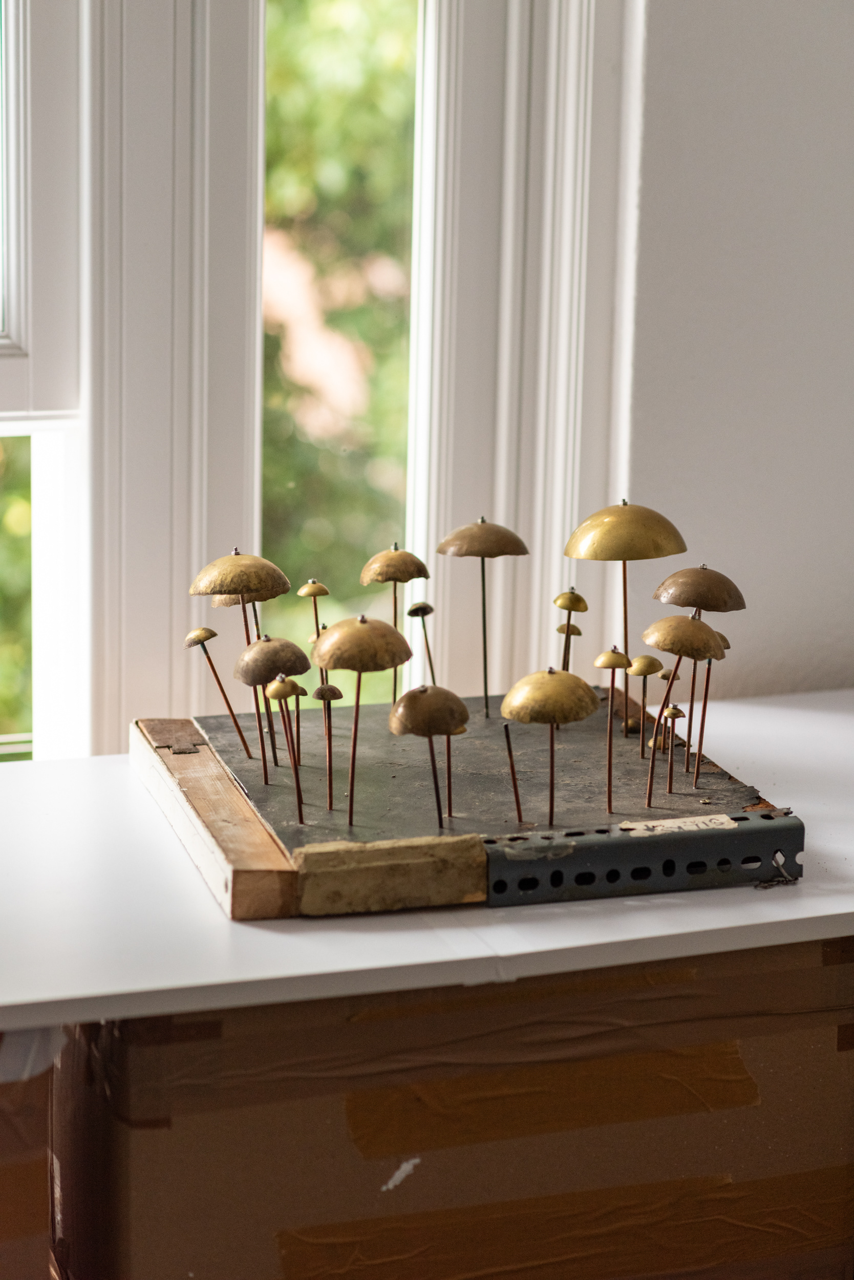 Bodie Stanley - Fairy Ring - 2025 - steel, brass, wood and concrete - 38 x 38 x 36 cm