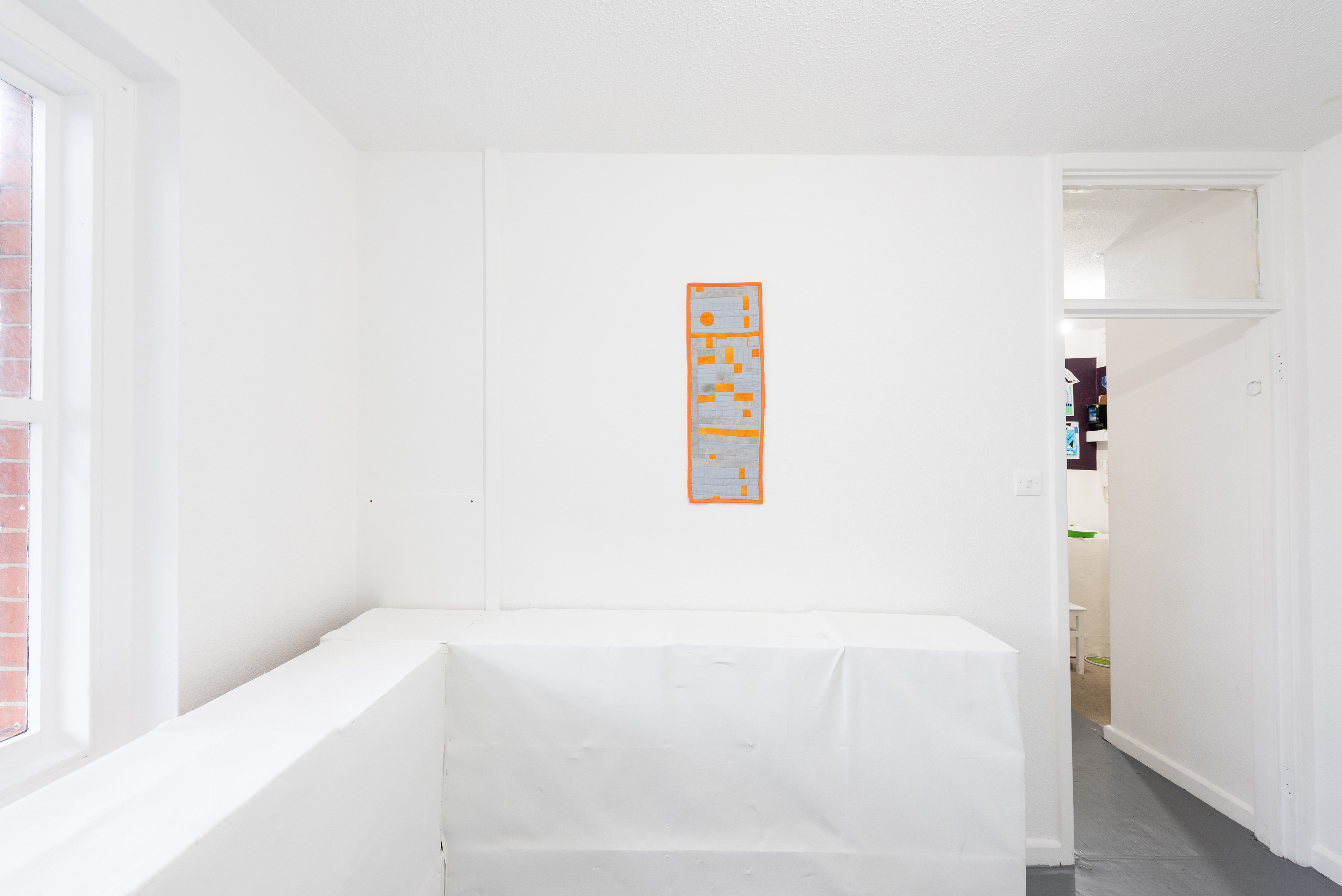 Lucinda Purkis - 'Pocket Landscape' - 2024 - Procion dyed & ink stained cotton, patchworked and quilted with appliqué - 28 x 78 cm 