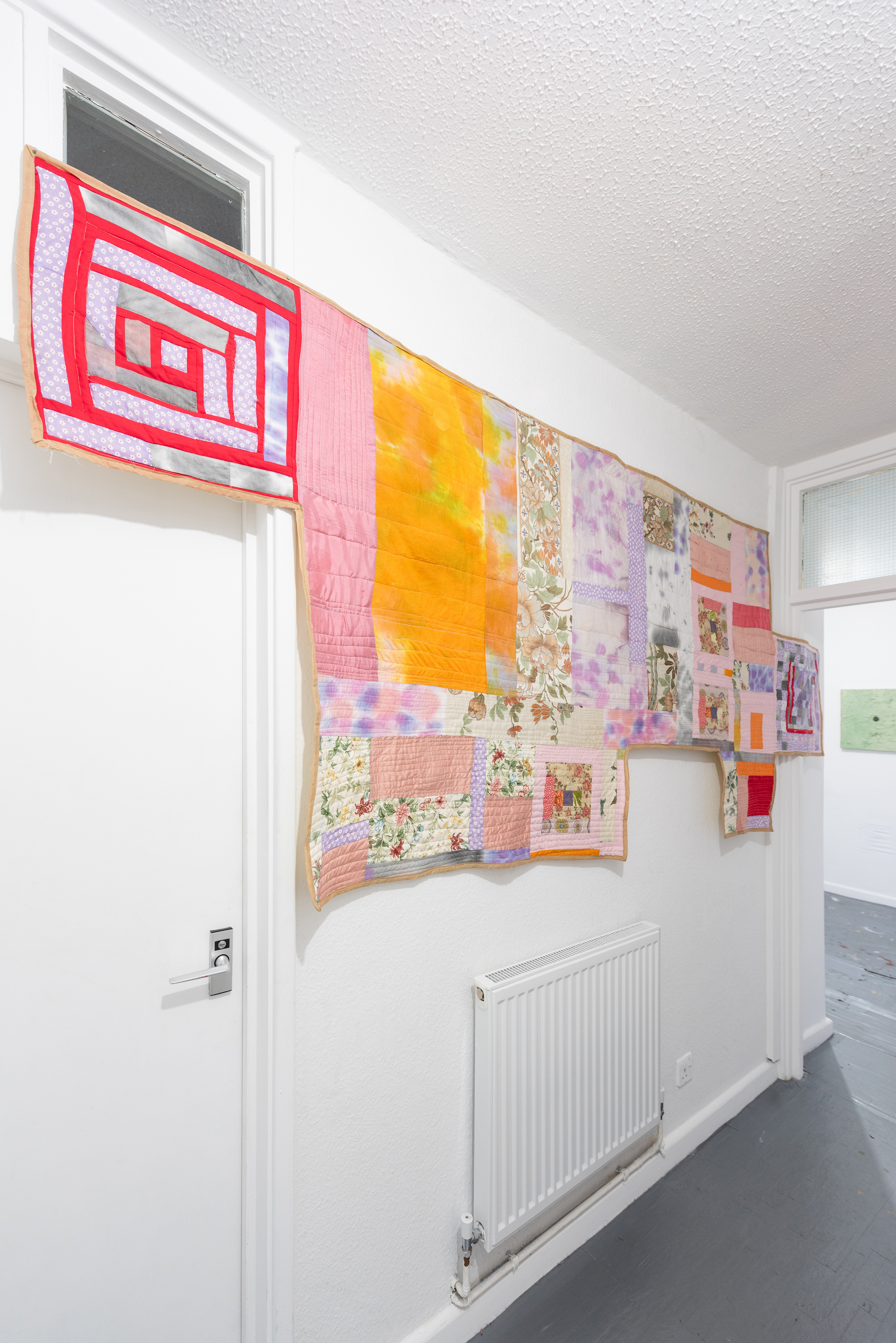 Lucinda Purkis - Quilt Fragment - 2024 - ink stained & procion dyed cotton, patchwork, assorted fabrics, quilted - 116 x 267 cm