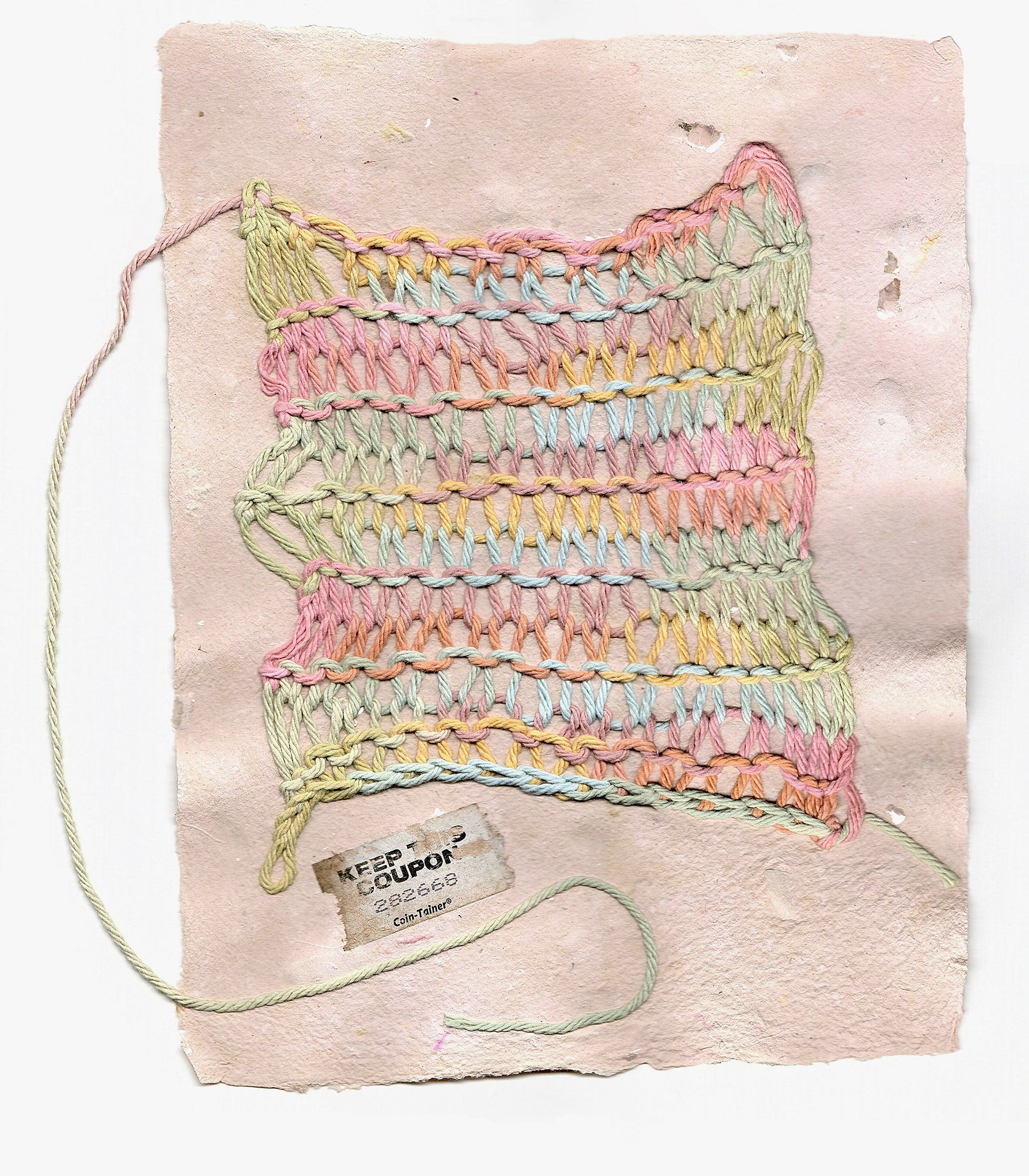 "Ticket", handmake paper with knit and found inclusions.