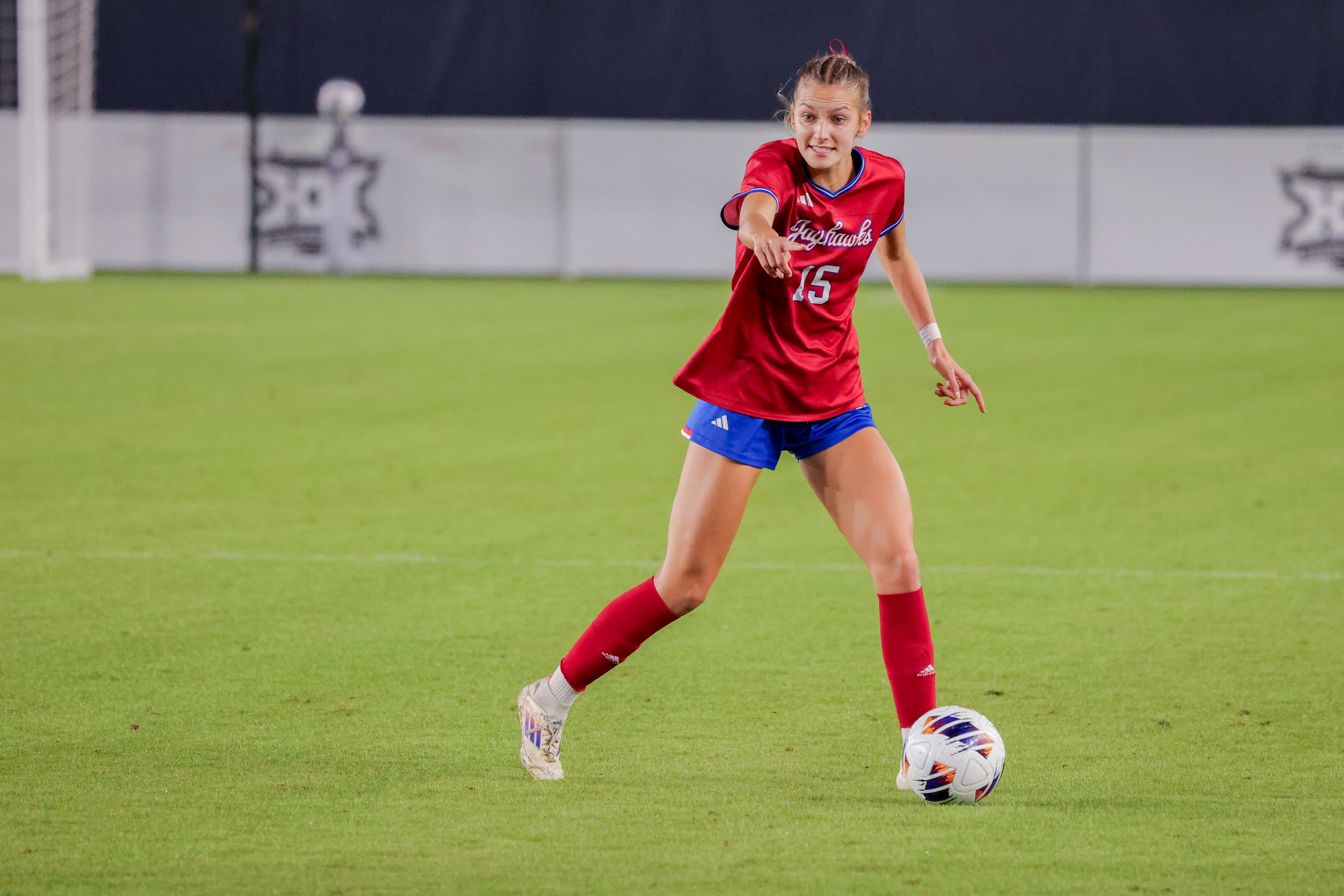 KU sophomore Caroline Castans directs a teammate during the Jayhawks' Big 12 tournament match against Texas Tech at CPKC Stadium in Kansas City, MO. on Wednesday, Nov. 6, 2024.