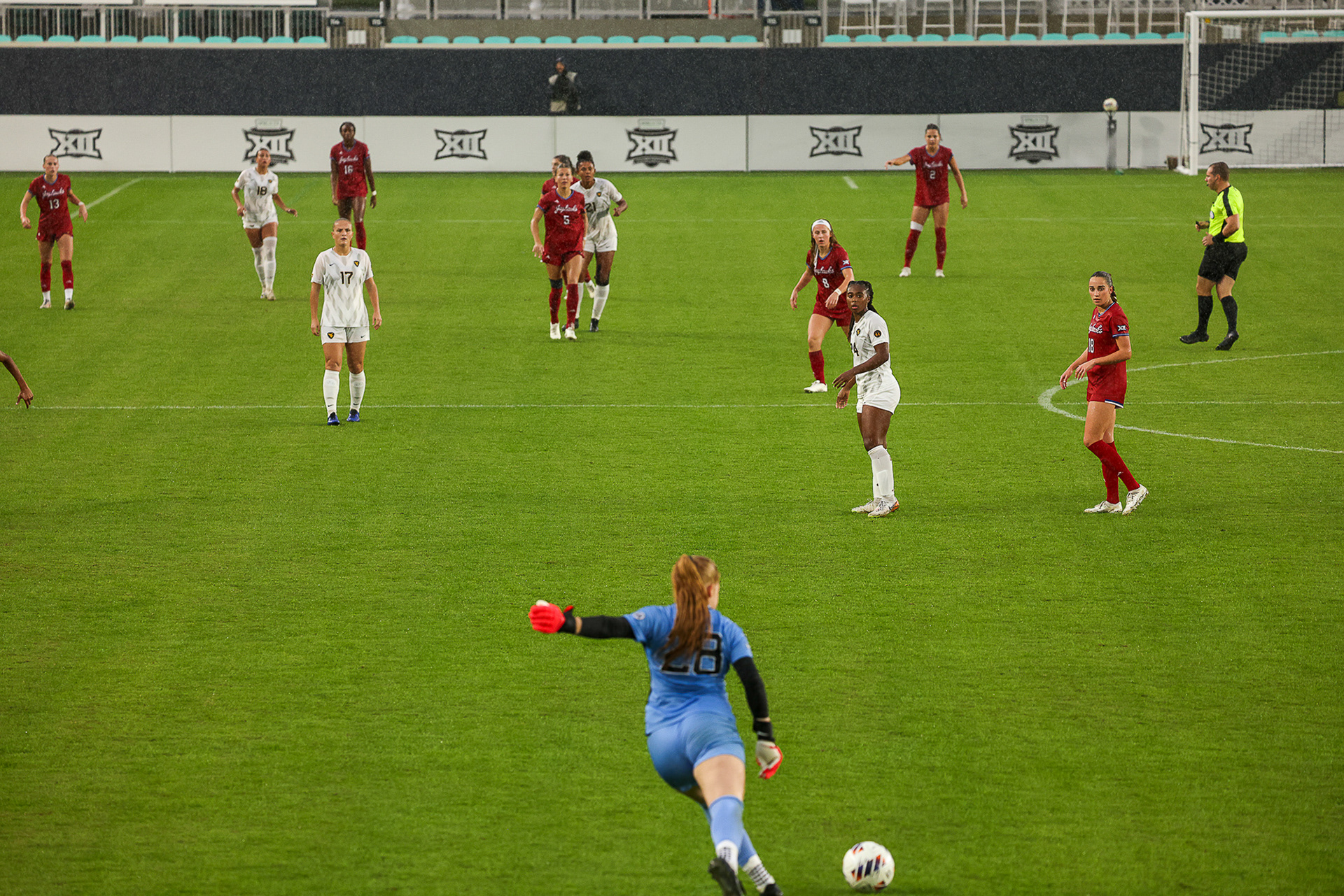 Kansas and West Virginia women’s soccer players await the kick from the WVU goalkeeper at CPKC stadium in Kansas City, Mo. on Saturday, Nov. 2, 2024.