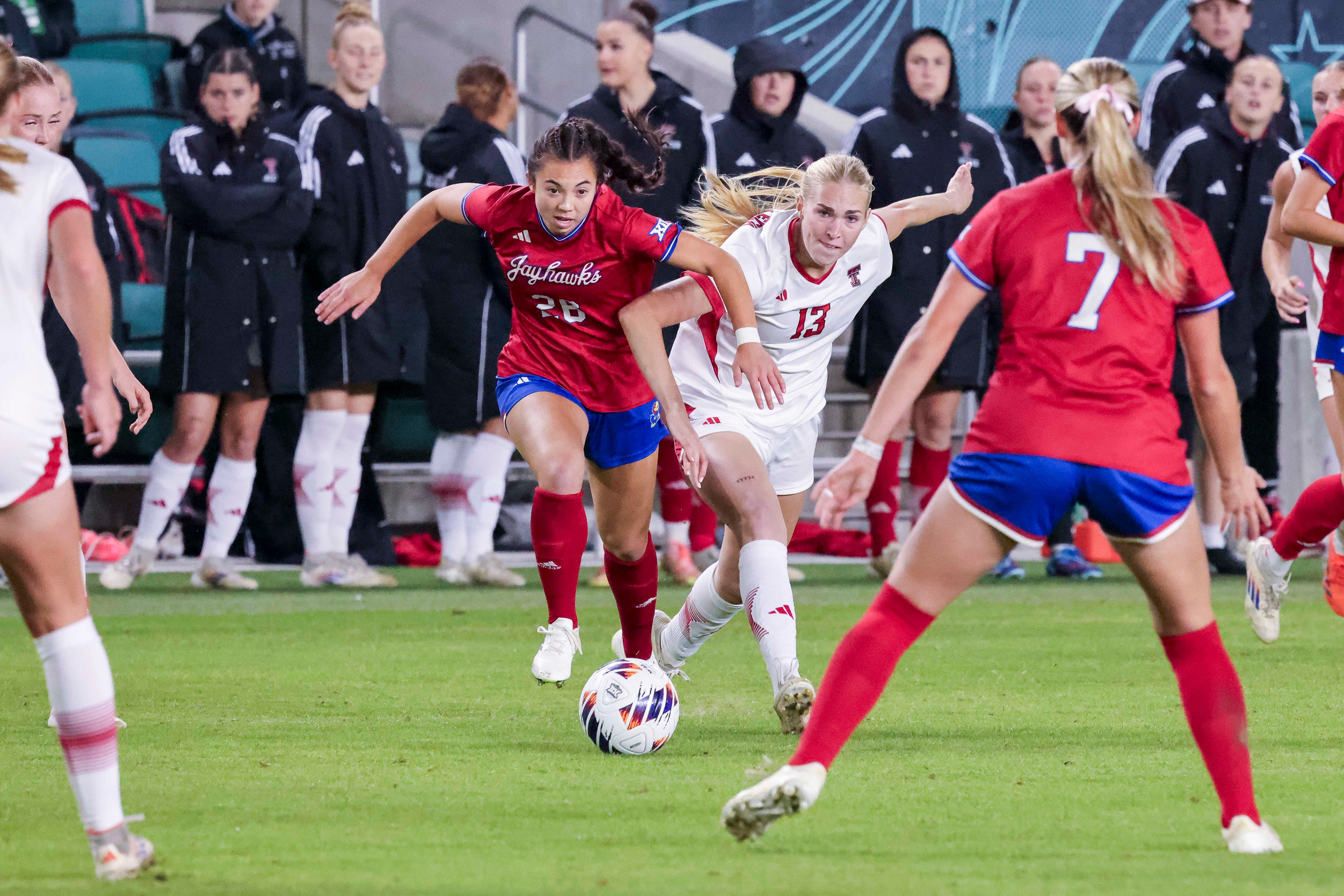 KU freshman Sophia Nickel fights for position during the Jayhawks' match against Texas Tech at CPKC Stadium in Kansas City, MO. on Wednesday, Nov. 6, 2024.