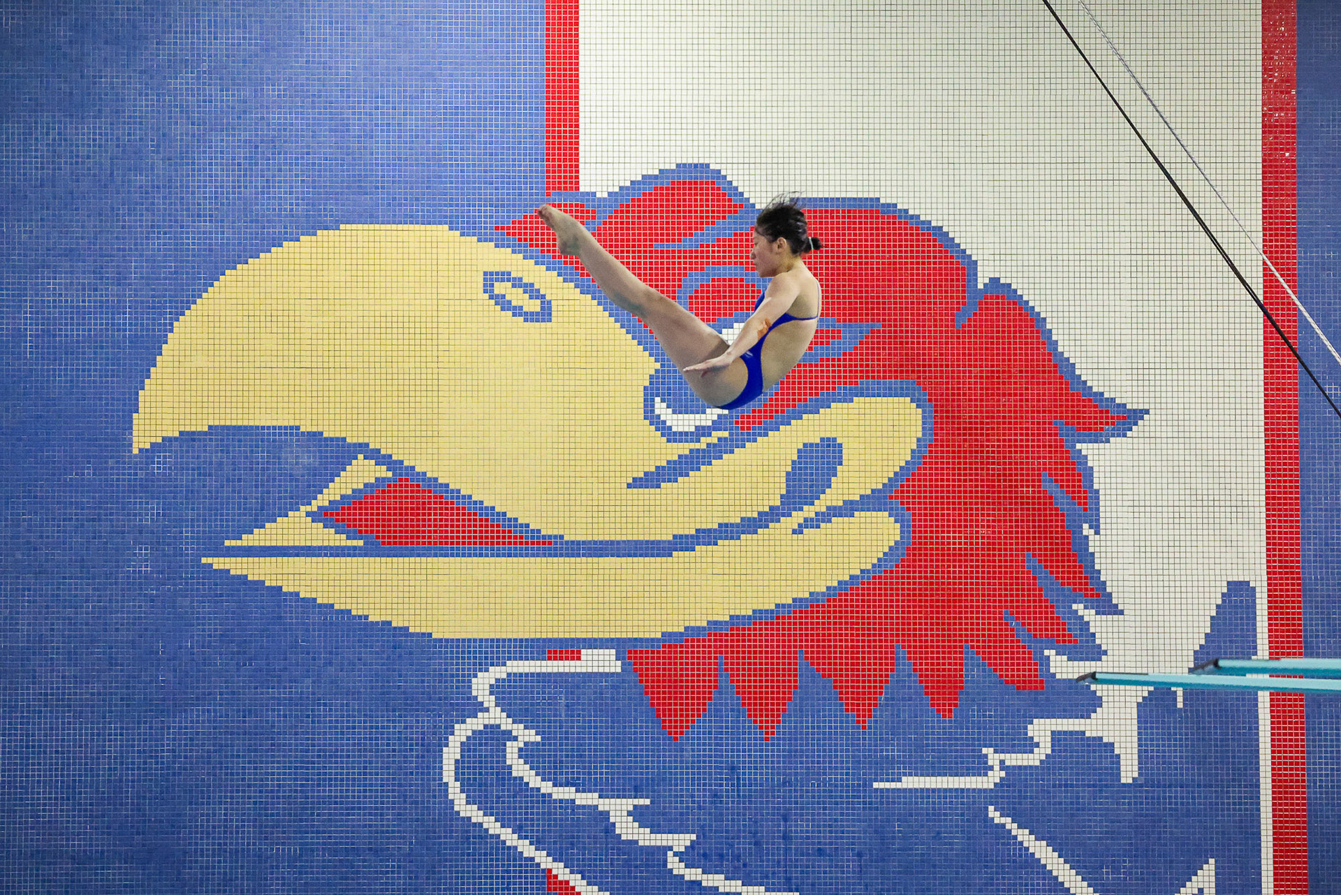 KU sophomore diver Shiyun Lai performs her routine during the Jayhawks' meet against South Dakota on Friday, Oct. 25, 2024, at the Robinson Natatorium in Lawrence, Kan.