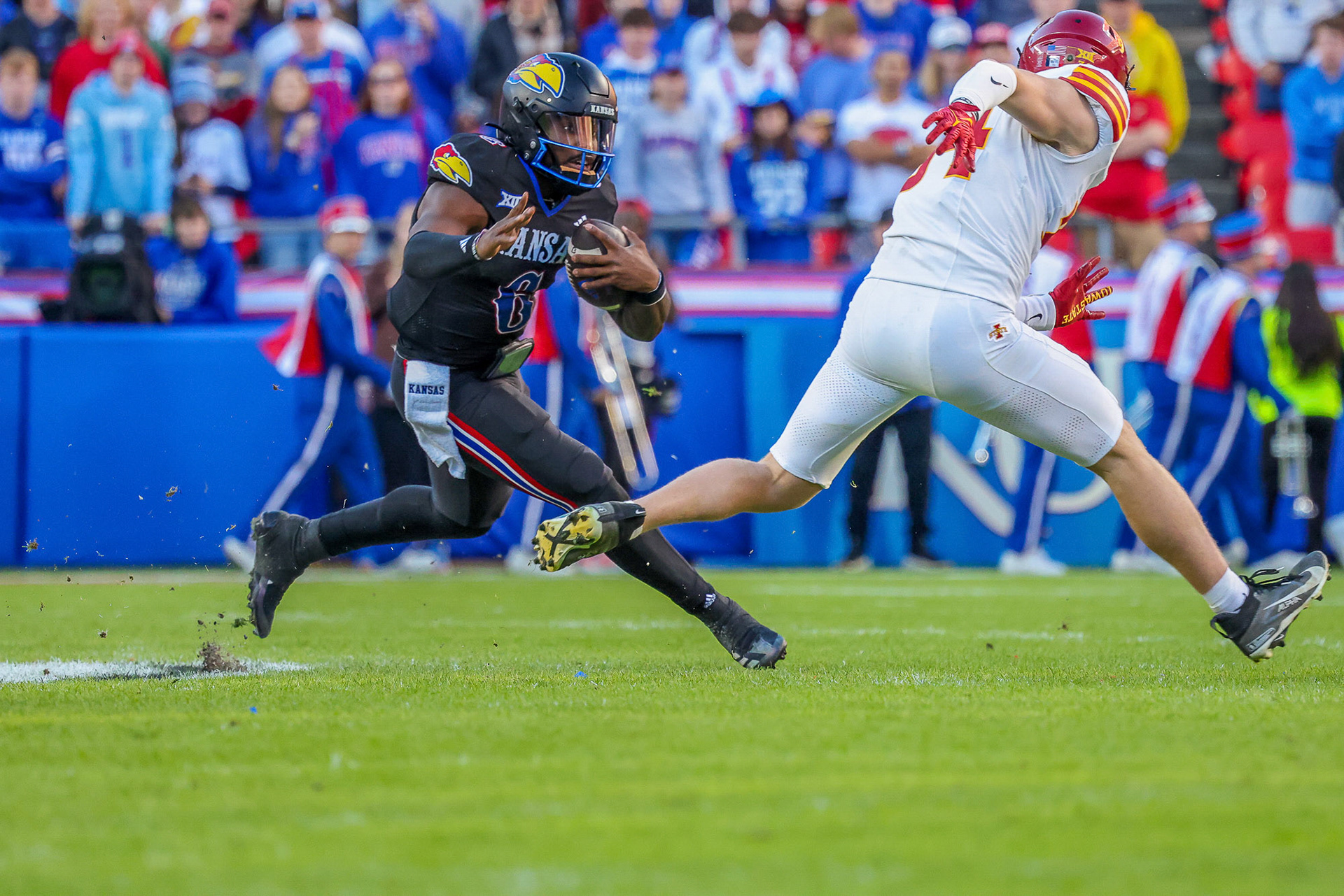 KU quarterback Jalon Daniels makes an Iowa State defender miss during the Jayhawks' game at Arrowhead Stadium in Kansas City, Mo. on Saturday, Nov. 9, 2024.
