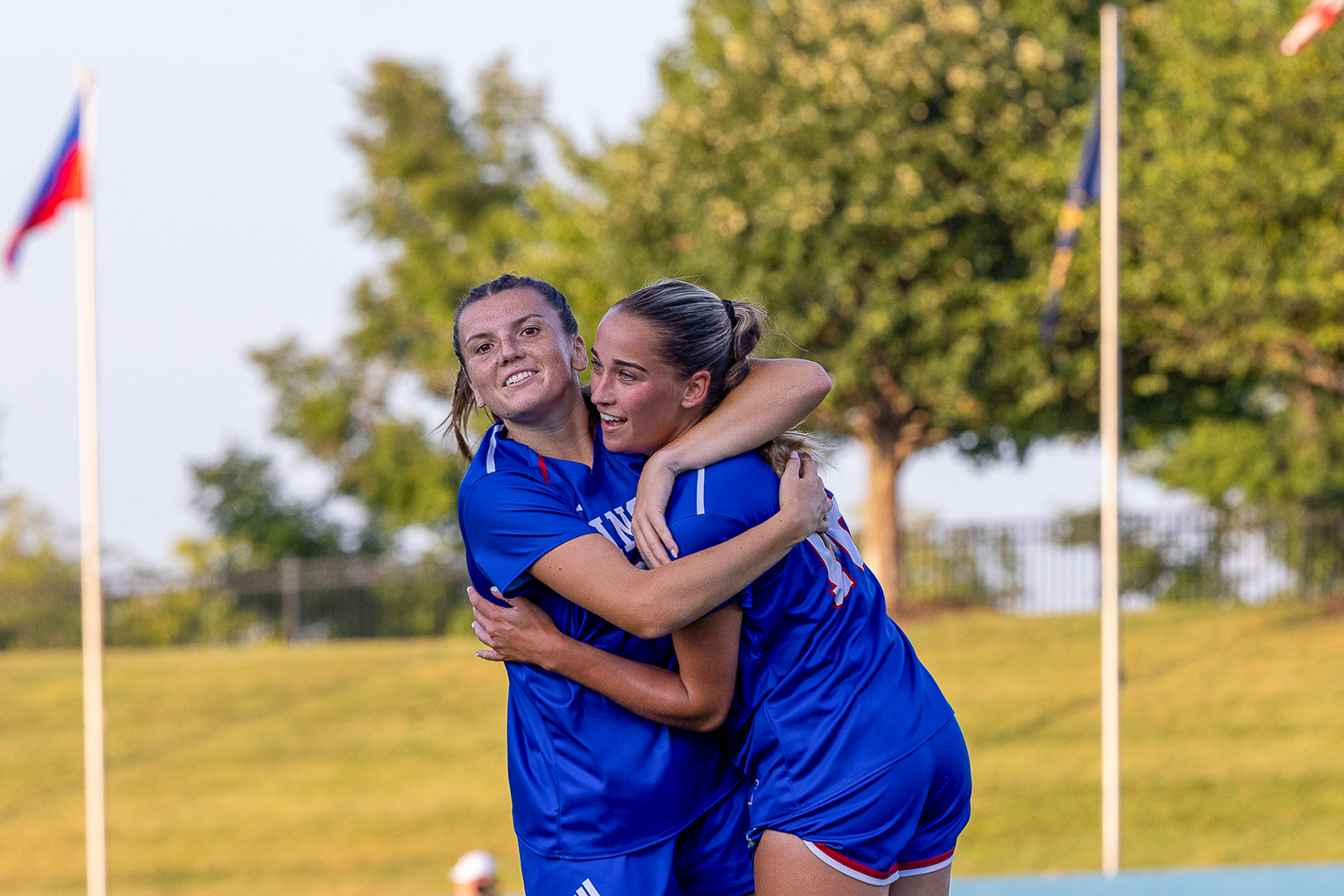 KU sophomore Jillian Gregorski hugs senior Lexi Watts after a goal scored by Watts against Missouri State on Thursday, Aug. 14, 2025 at Rock Chalk Park in Lawrence, Kan.