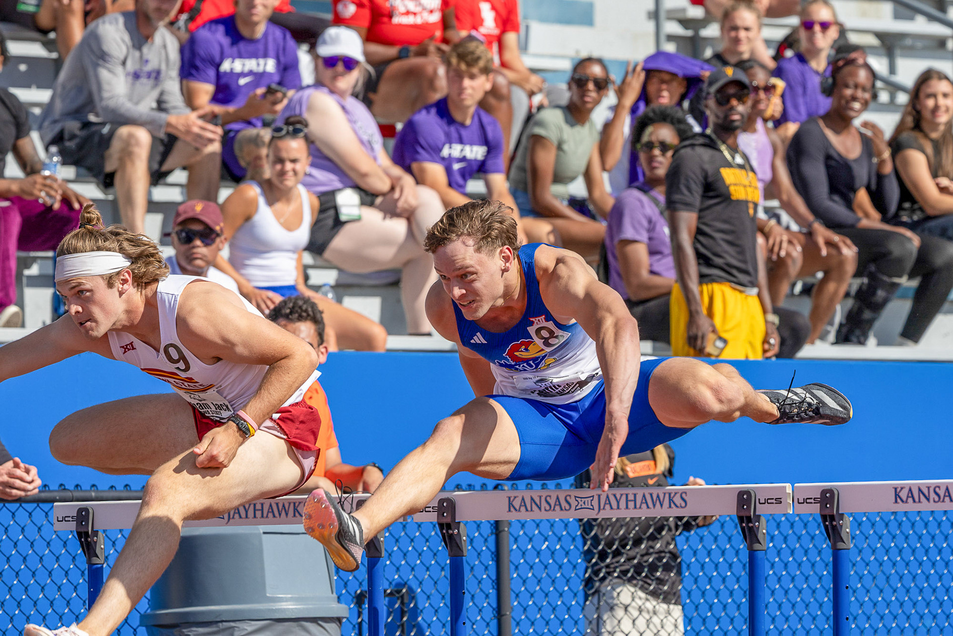 KU freshman Aaron Merritt clears a hurdle during a flight of the Men's 110-meter hurdle event on Friday, May 16, 2025, during the Big 12 Outdoor Track and Field Championships hosted at Rock Chalk Park in Lawrence, Kan.