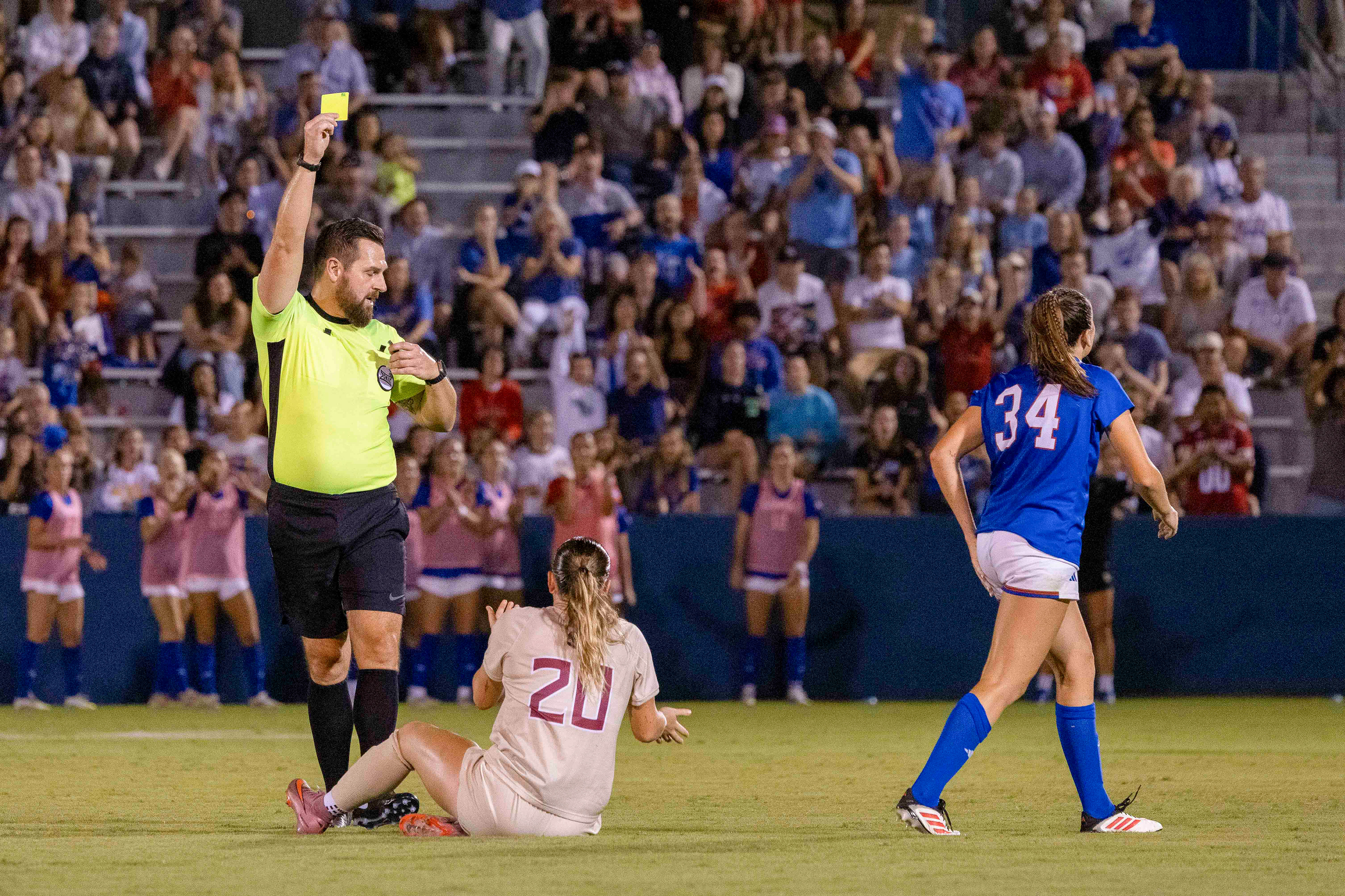 KU sophomore Jillian Gregorski (34) walks off as Florida State's Heather Gilchrist is given a yellow card during the Jayhawks' match on Thursday, Aug. 28, 2025, at Rock Chalk Park in Lawrence, Kan.