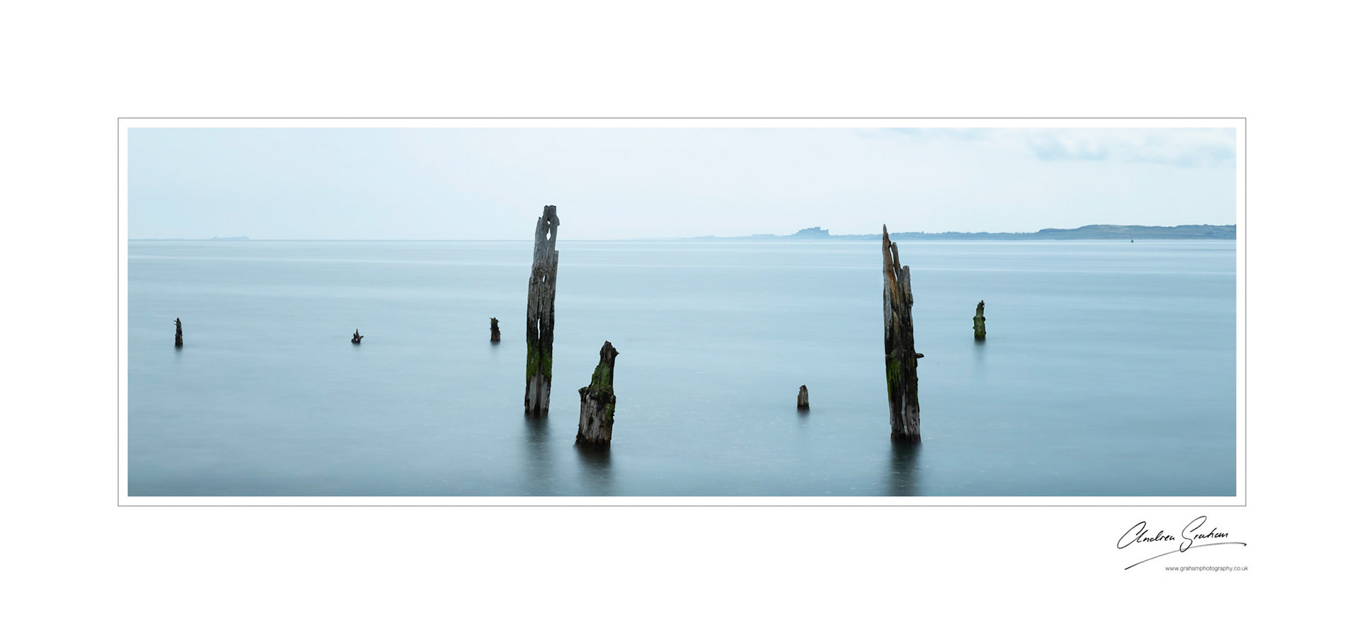 All is calm.  Looking across from Lindisfarne towards Bamburgh and the Farne Islands