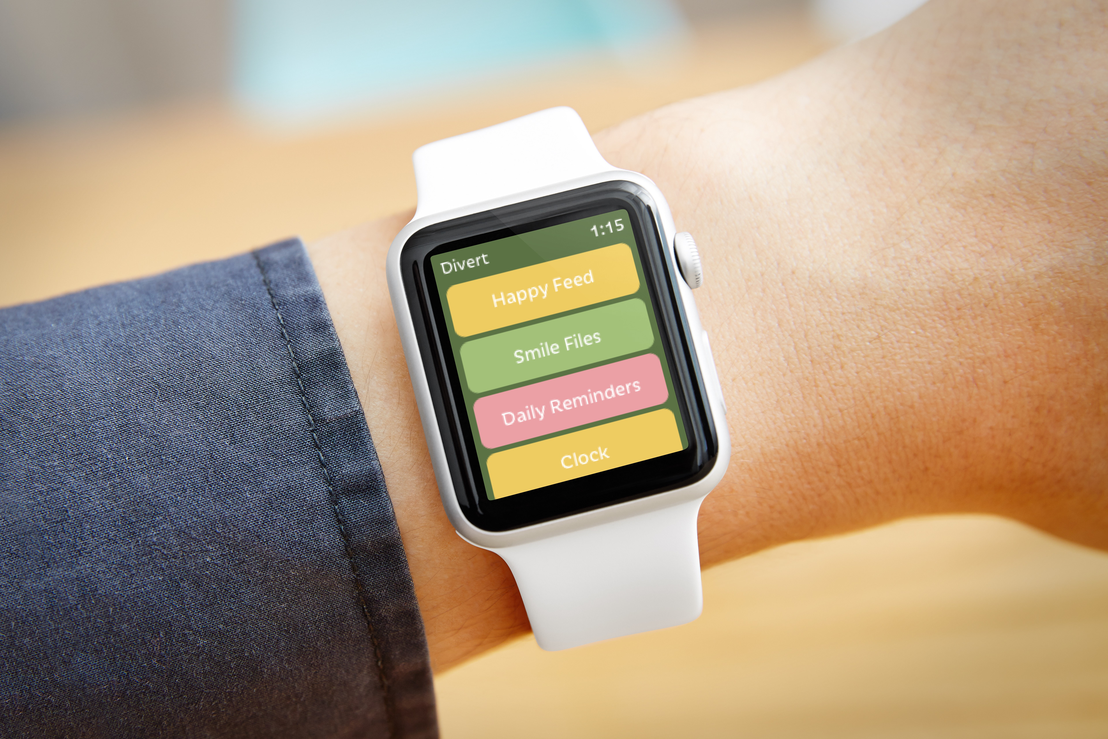 Mockup of a watch on a person's wrist, with Divert's homepage on the screen.