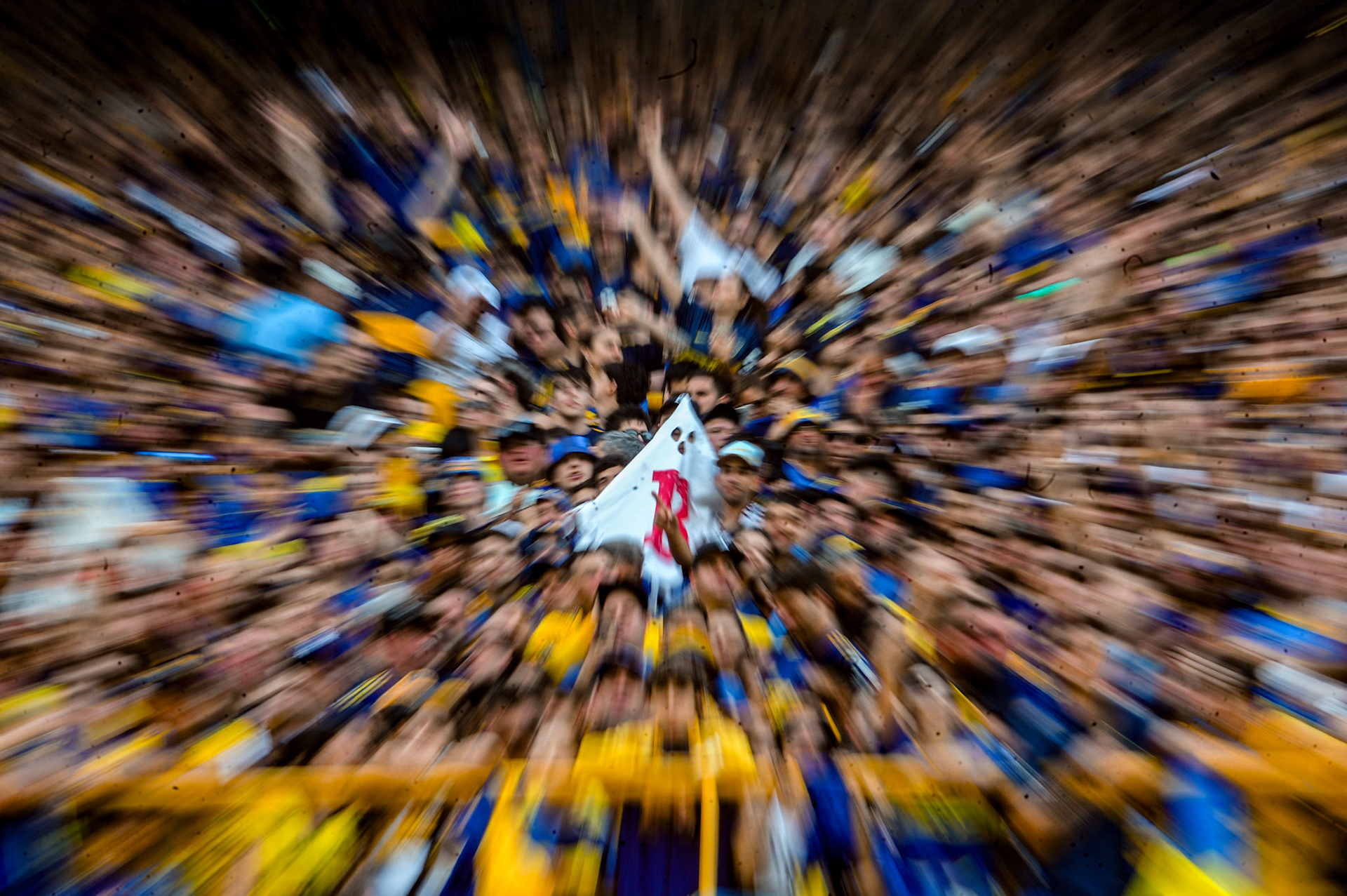 Boca Juniors supporters react in the stands as a symbolic “ghost of the B” appears during a Superclásico match at La Bombonera | Buenos Aires, 2024.
