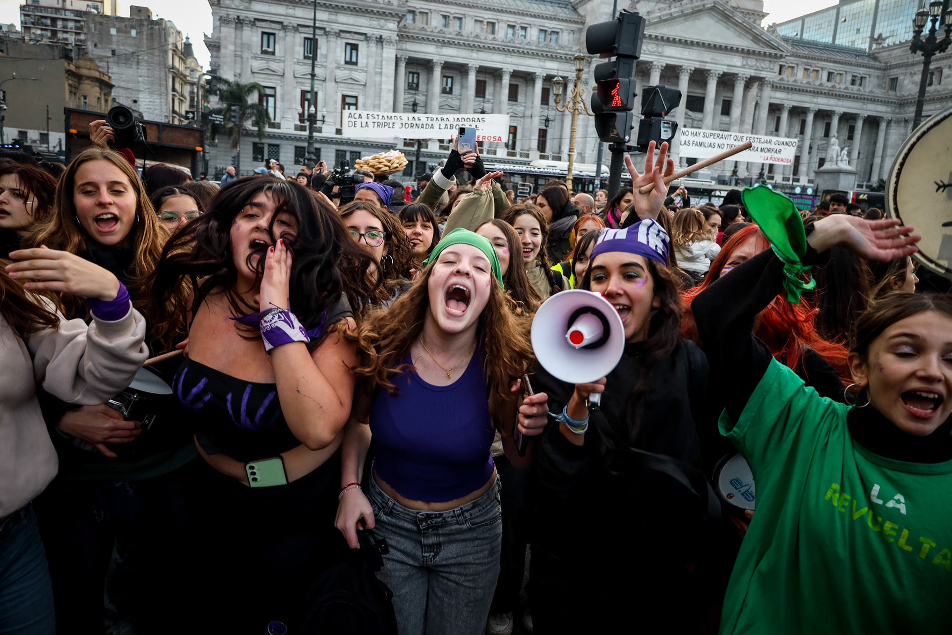 Demonstrators take part in a feminist protest marking the Not One (women) Less movement outside the National Congress | Buenos Aires, 2024.