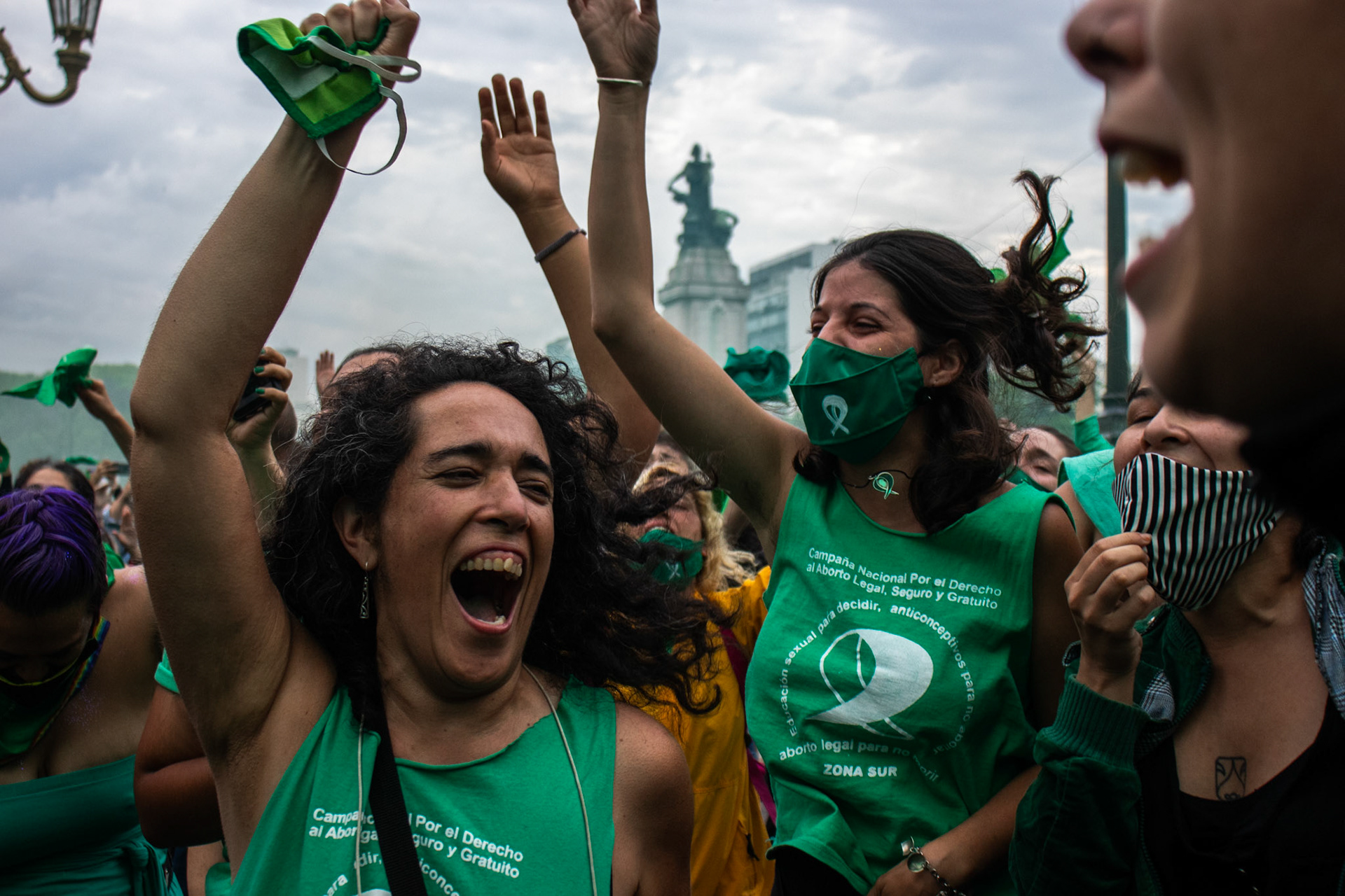 Feminist activists celebrate the approval of Argentina's abortion legalization bill outside the National Congress | Buenos Aires, 2020.