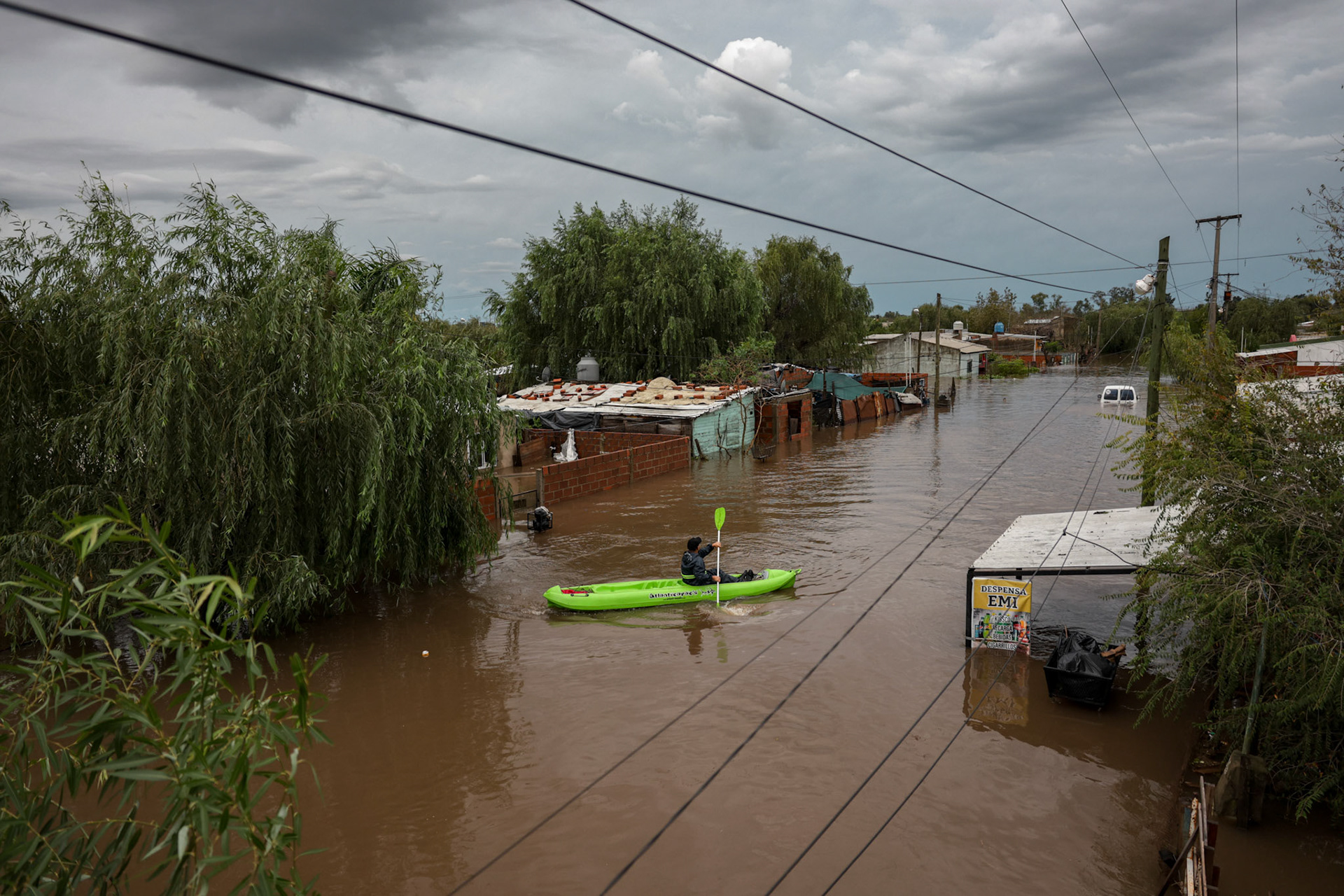Floodwaters inundate streets and homes following severe storms in Campana | Buenos Aires, 2025.