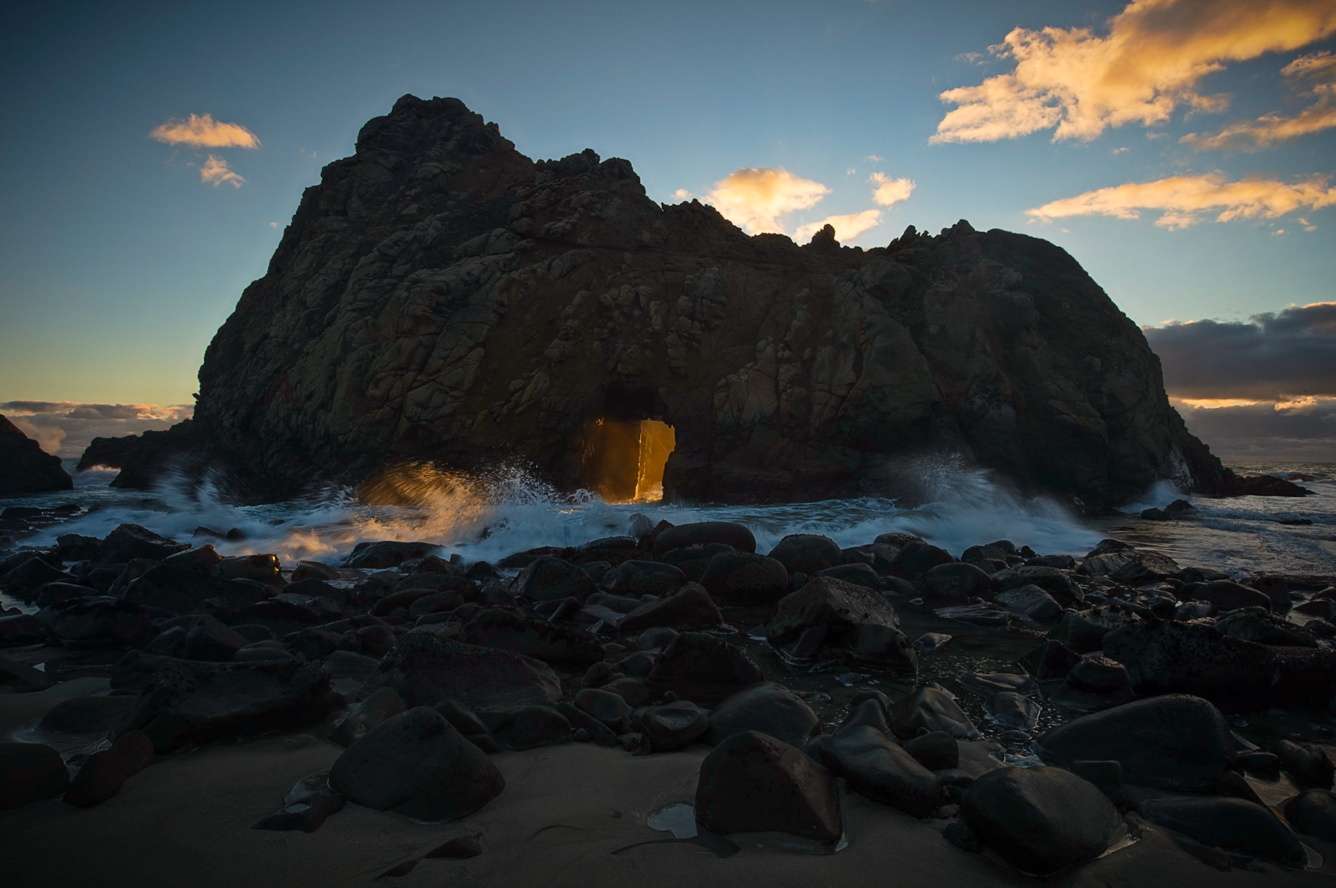 On our trip through California I was only able to work in one sunset opportunity at Keyhole Arch on Big Sur's Pfeiffer Beach. Though conditions weren't the greatest I was lucky to get a few seconds of sunset glow. Clouds on the horizon blocked the full effect of the sun. but I was still  happy with the results given this was  my first attempt. Good news is I'll be back there next year during/near the winter solstice to try again!     Thank you for viewing, voting and/or any constructive comments!